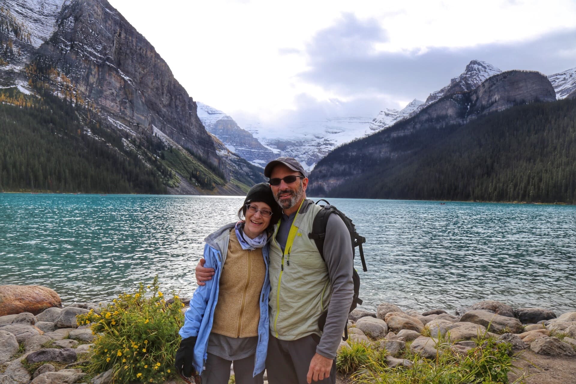 Couple posing on the lakeside