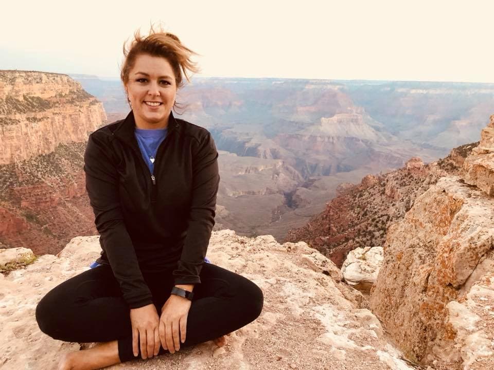 Travel advisor posing in a dried-out region