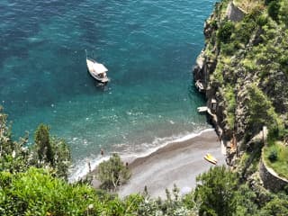 An Island with a boat in water
