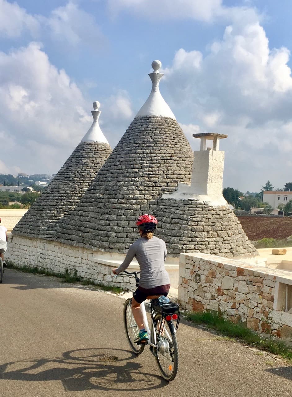 Melanie bicycling on the road