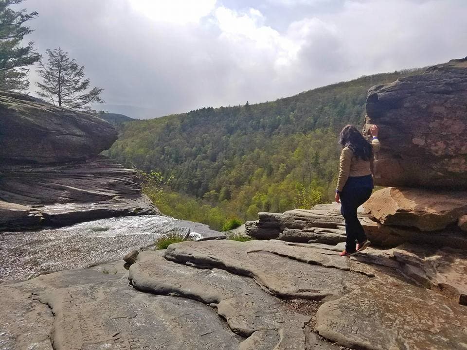 Advisor on a rocky hill.