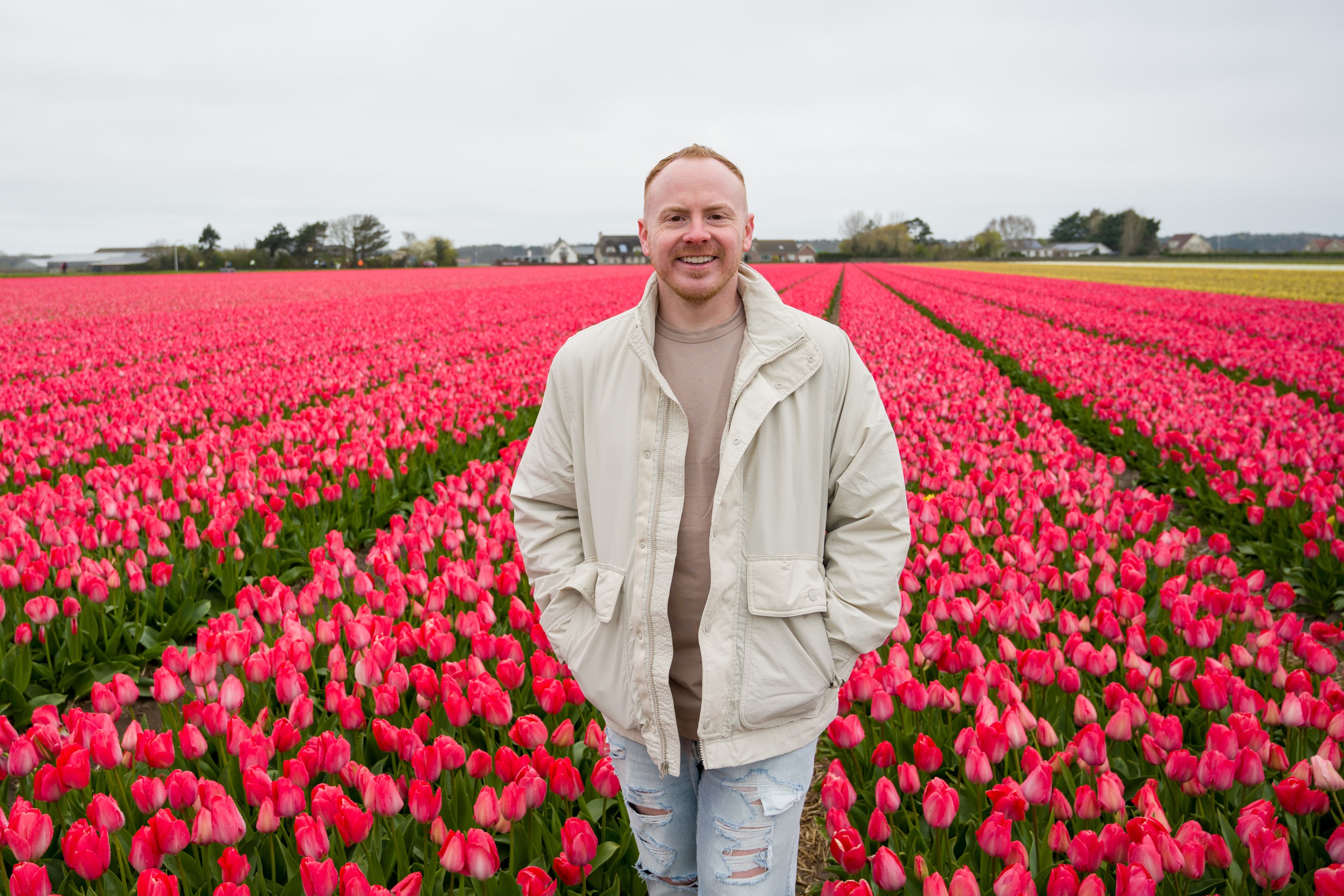 Travel advisor in a flower field