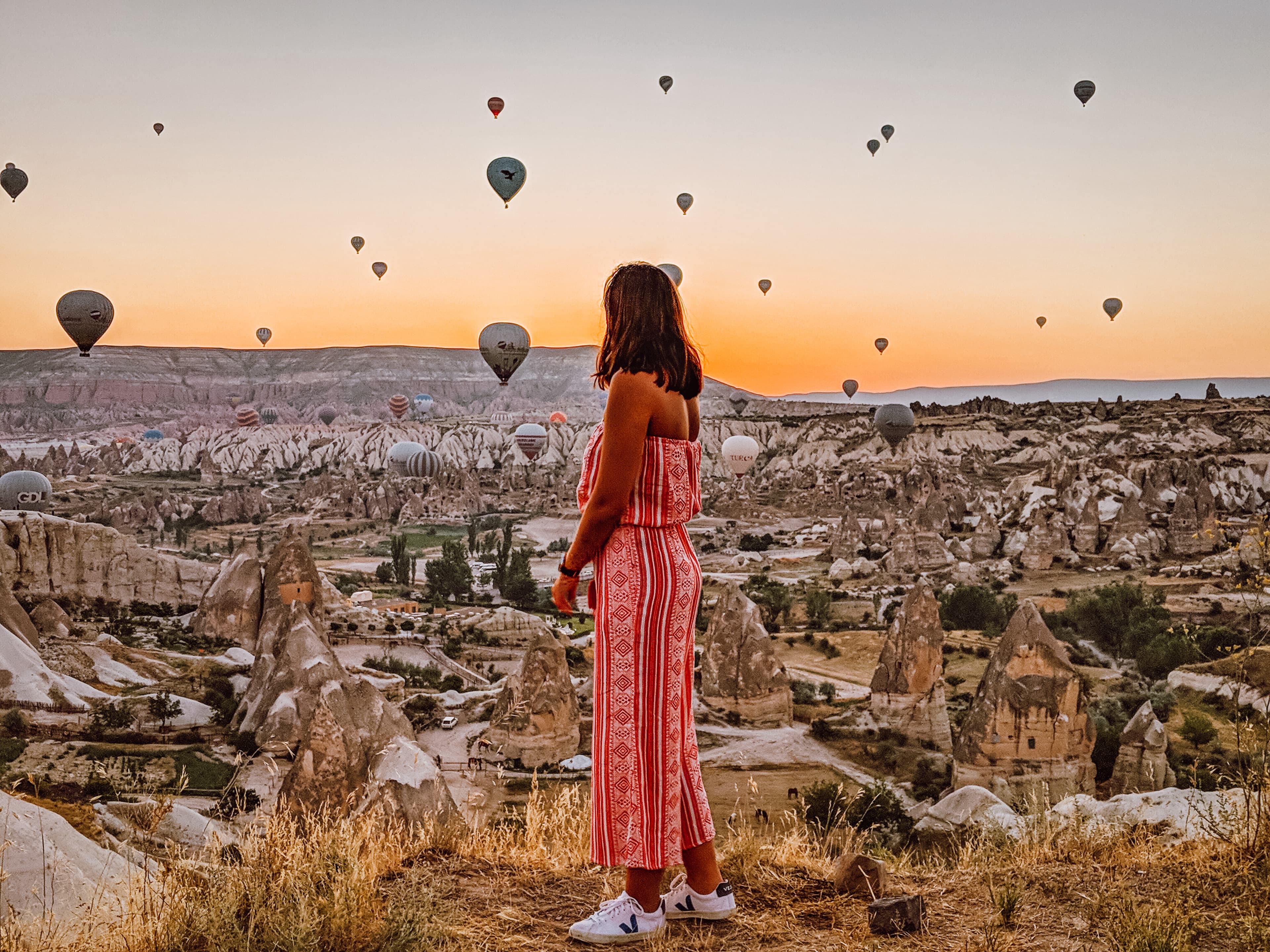 lita in front of hot air balloons