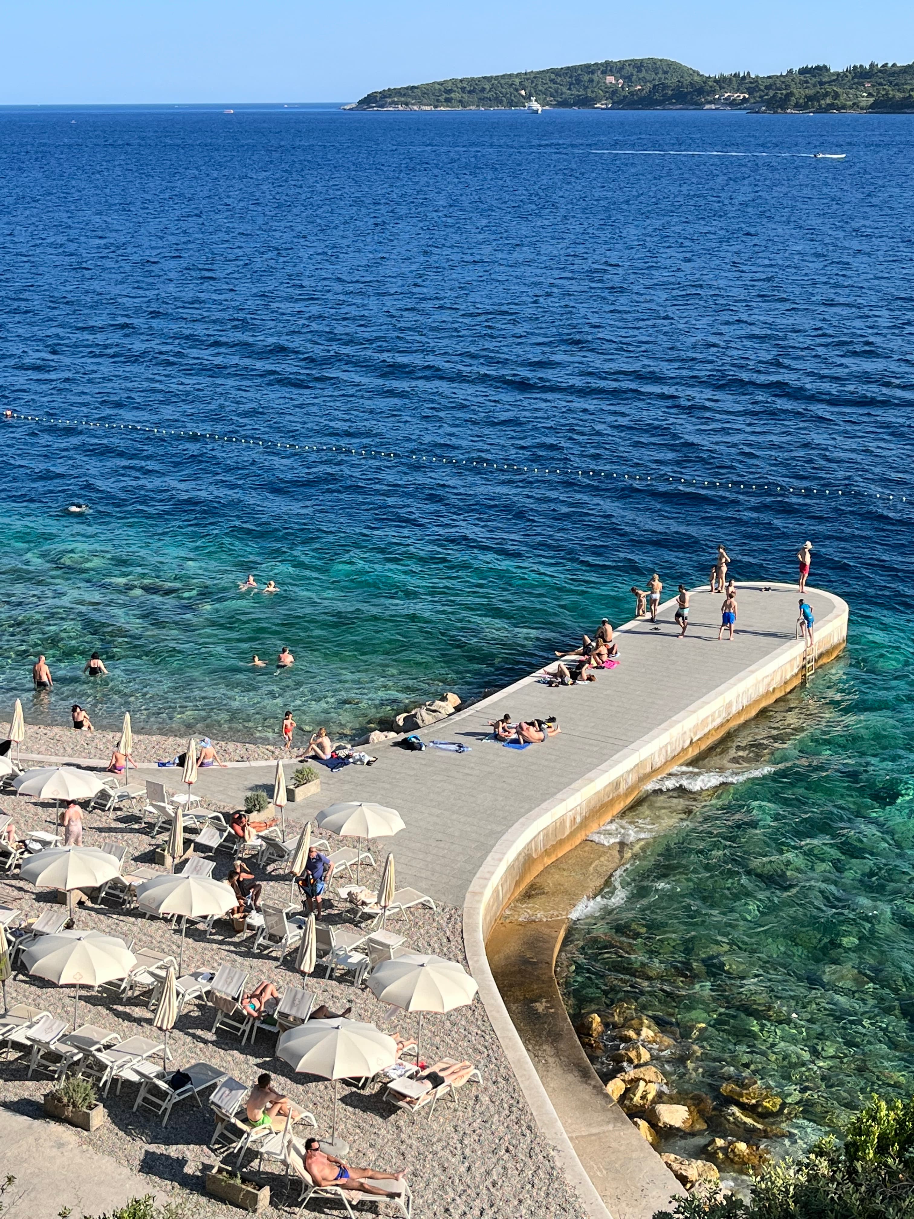People sun bathing on the beach