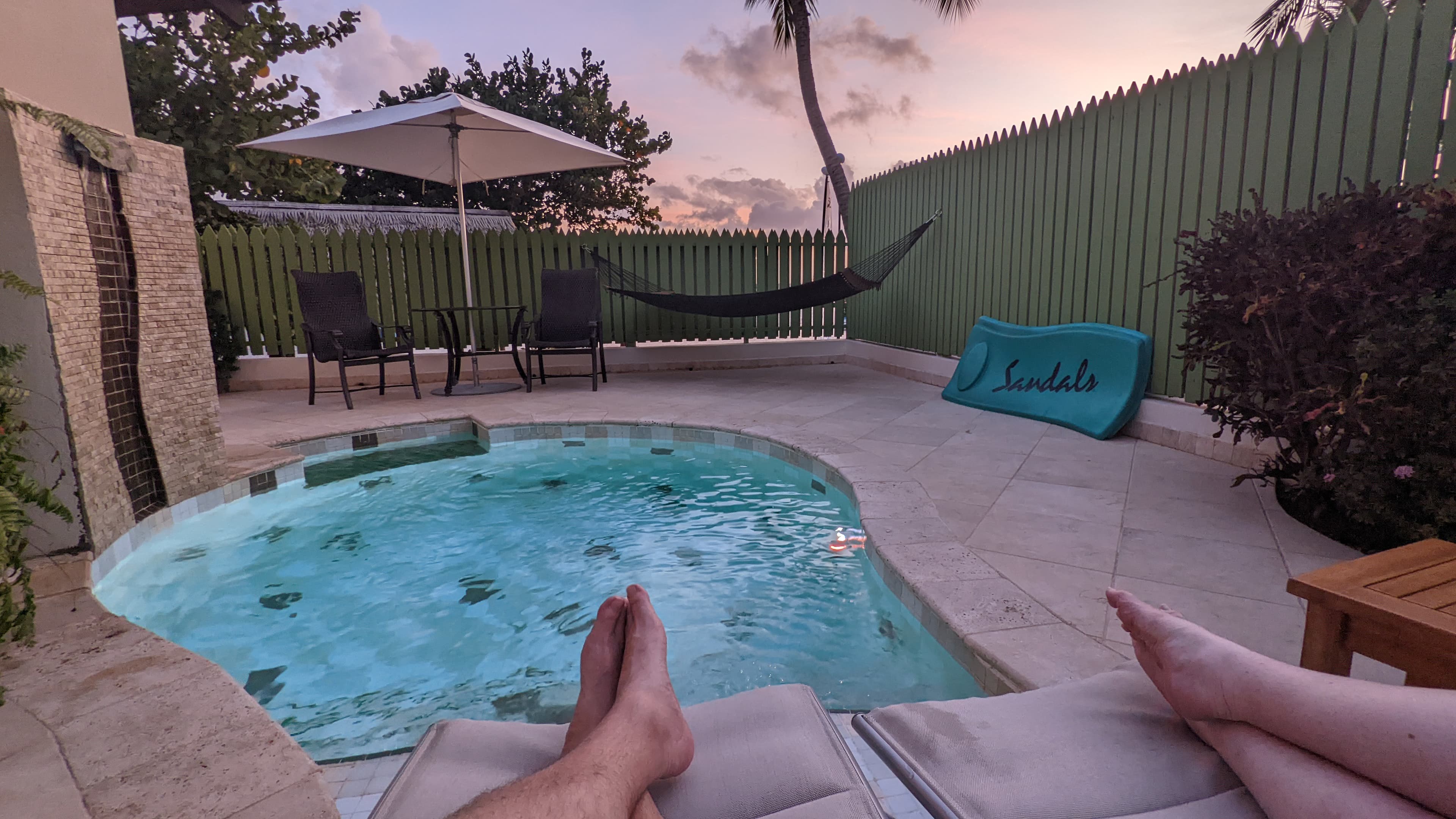 View of a pool in a backyard.
