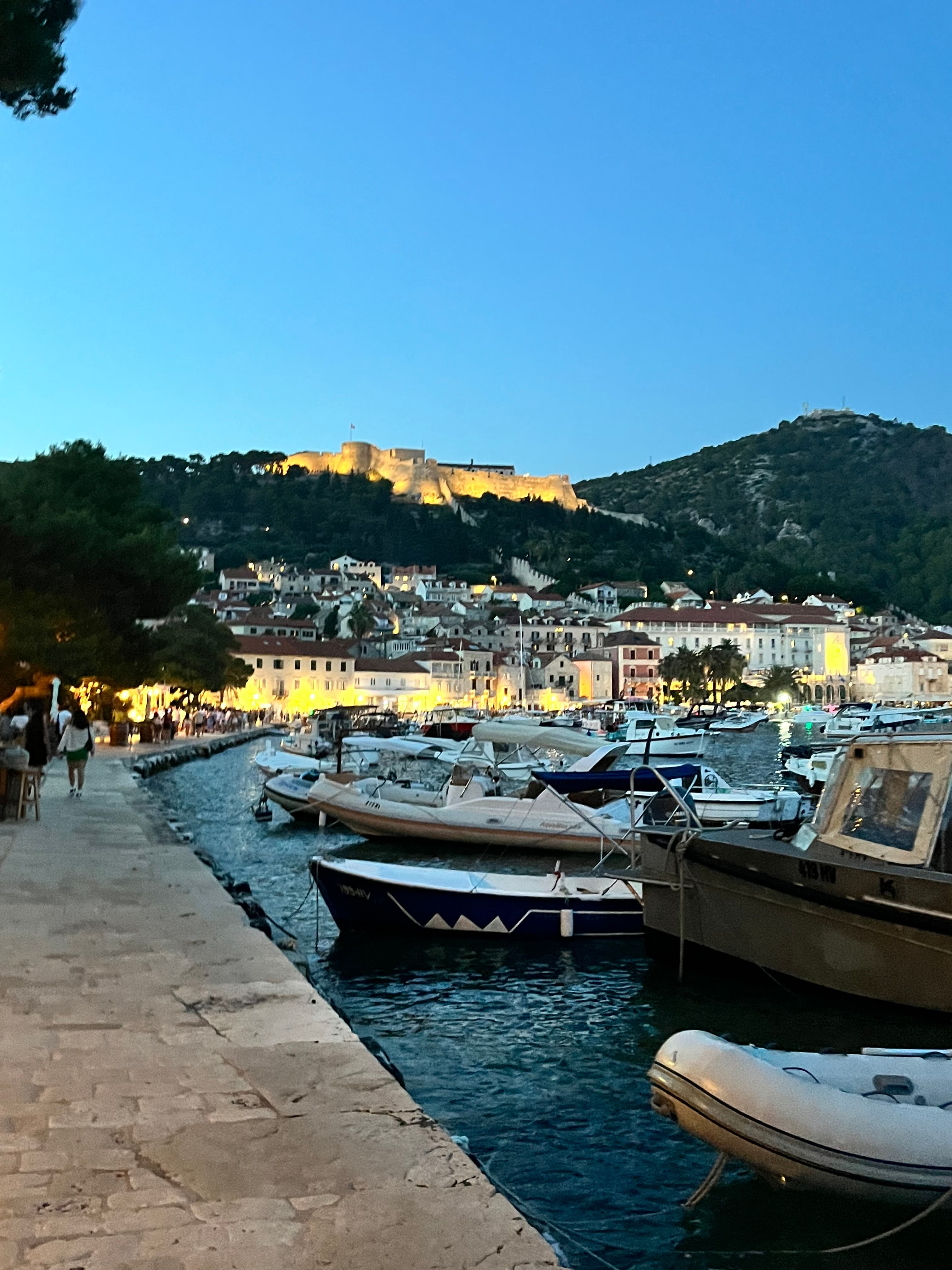 Boats parked on the pier