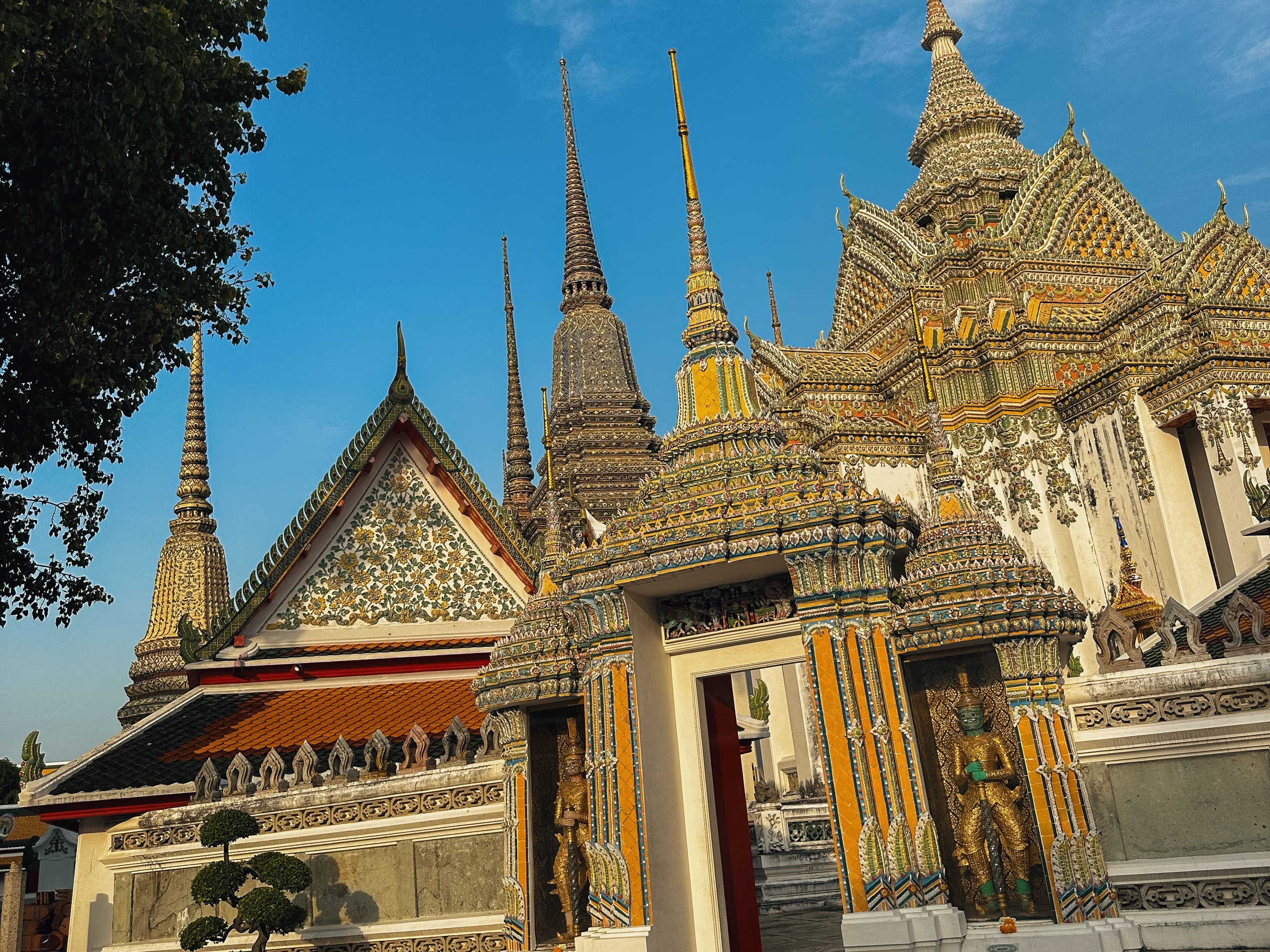 View of a colorful temple set against the blue sky