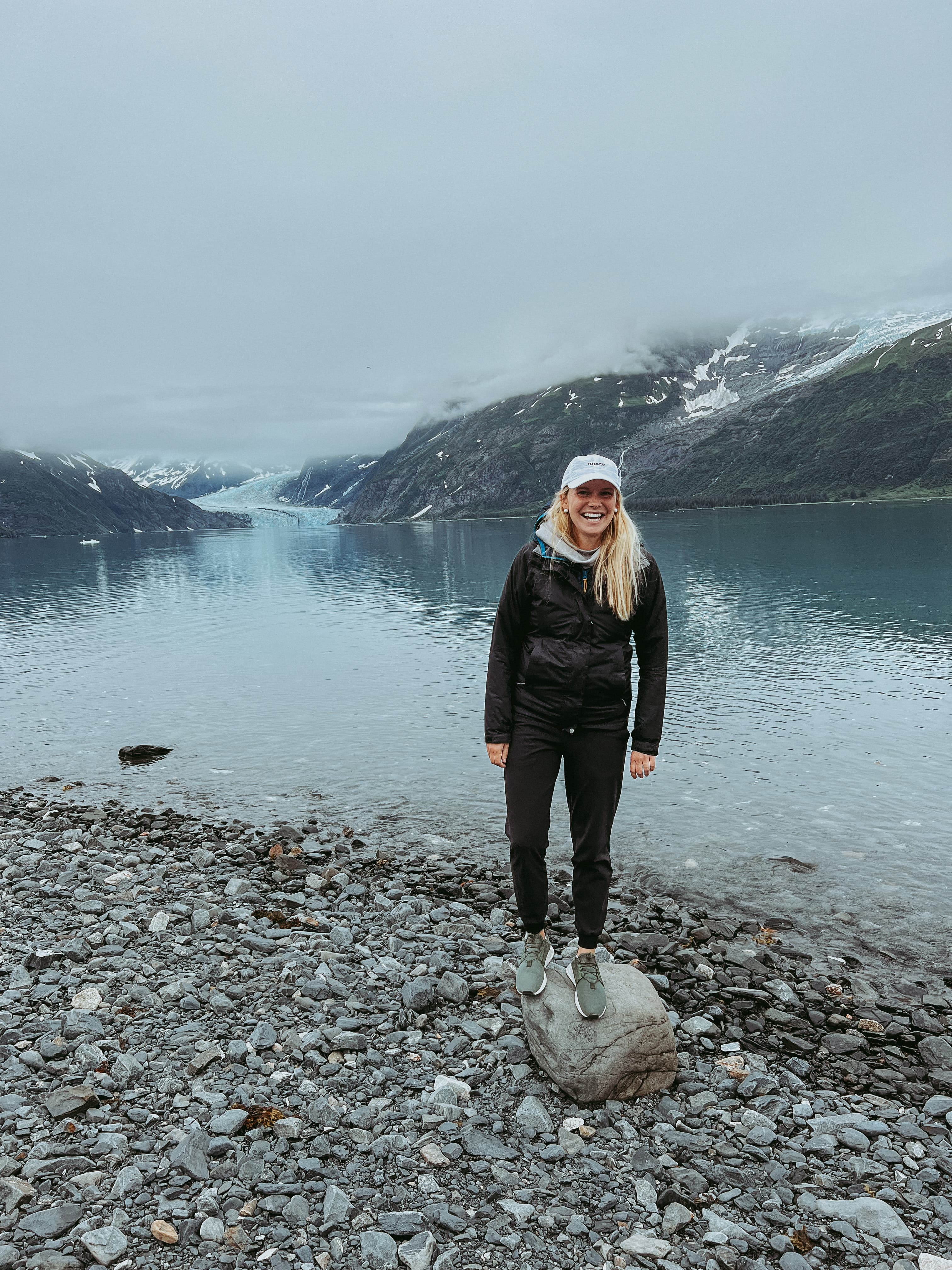 Picture of Lindsey in black suit near lake