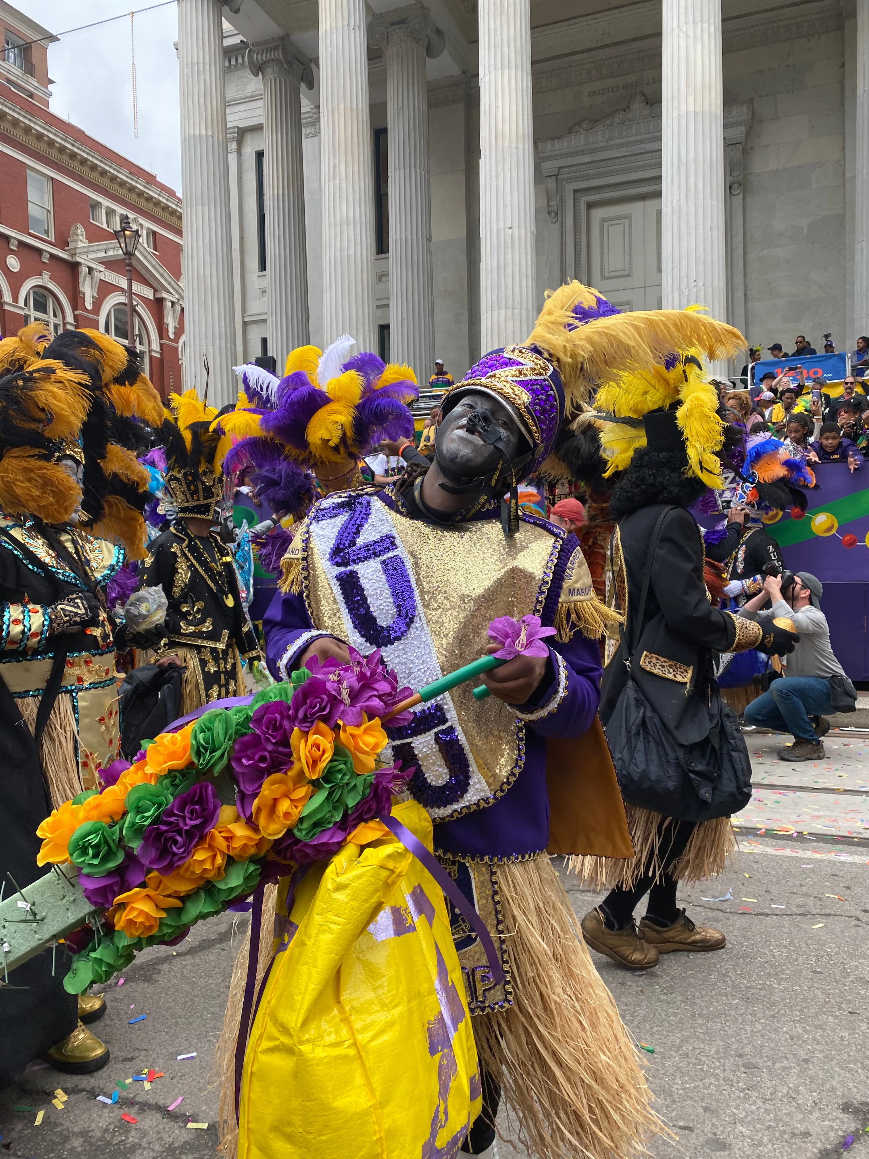 A street performer posing for a picture
