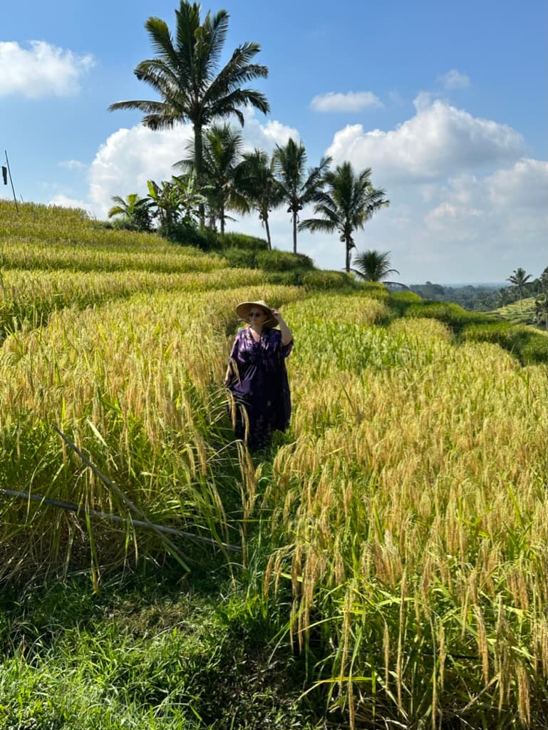 Travel advisor posing in crops