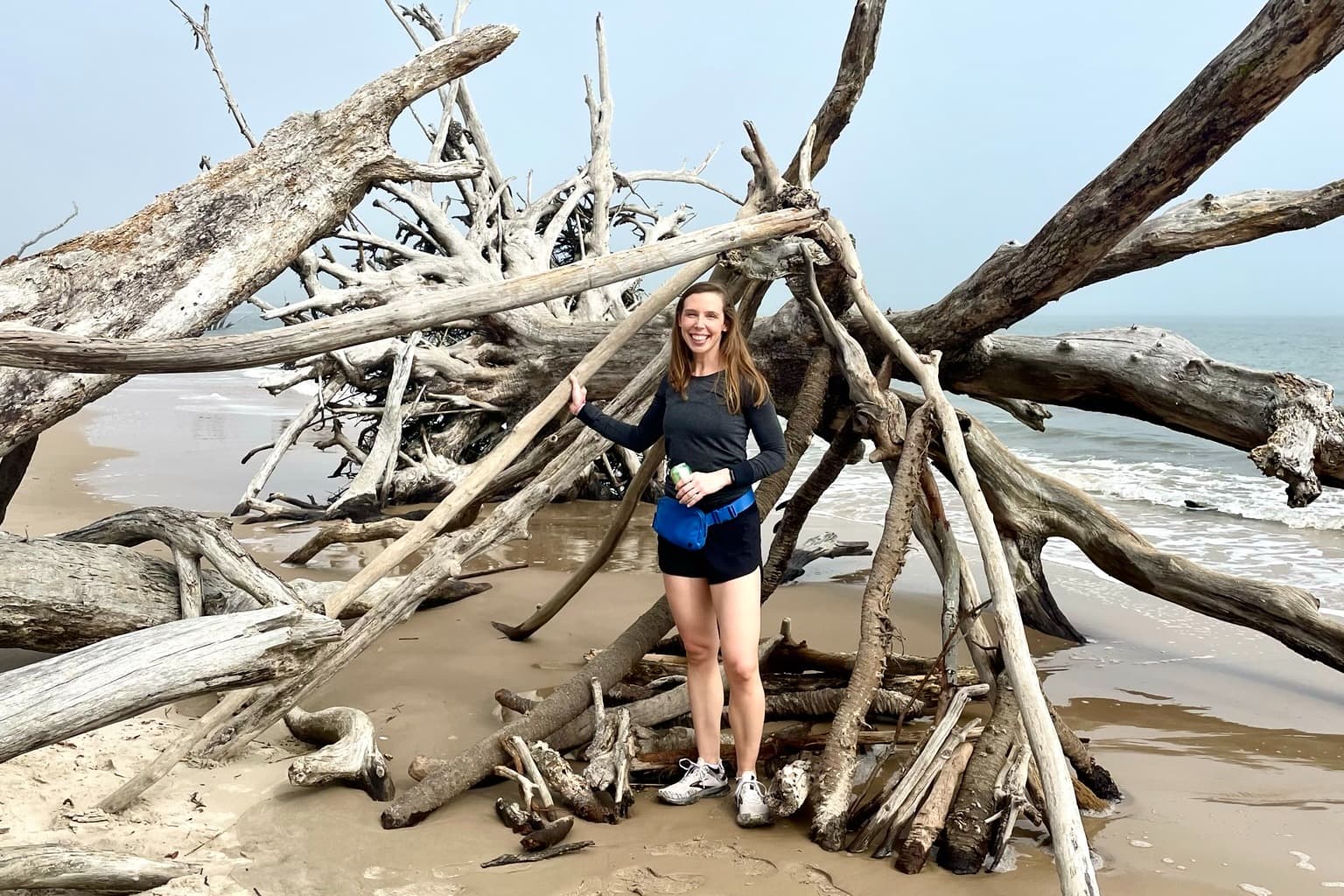 Callie in front of woods