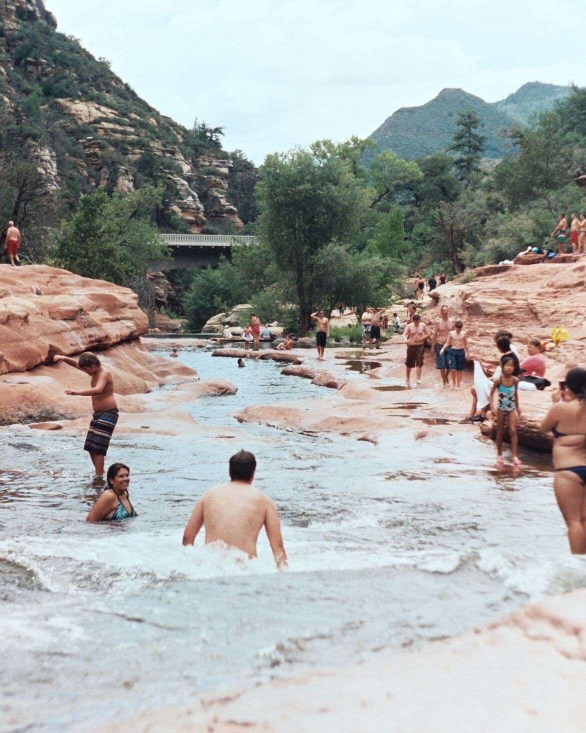 People enjoying in a swimming hole in Sedona