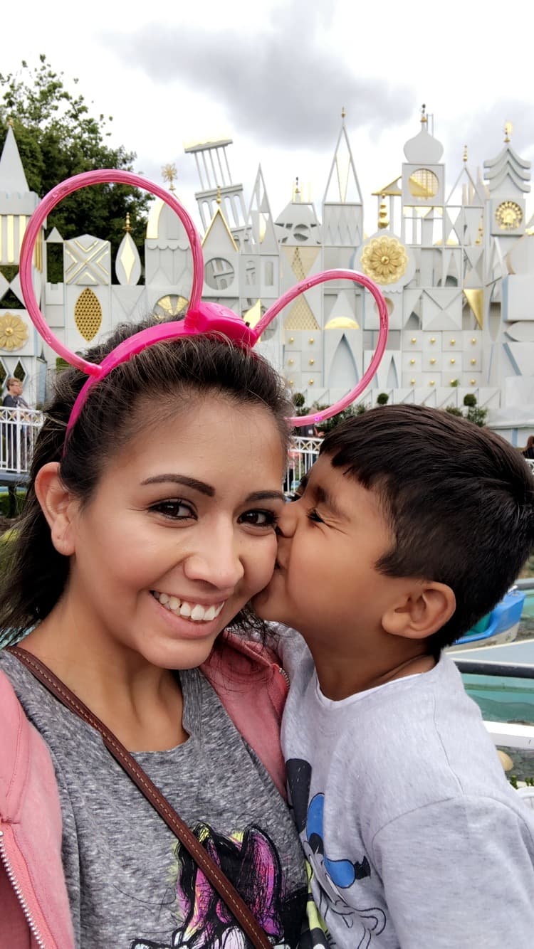 Travel advisor posing with a kid