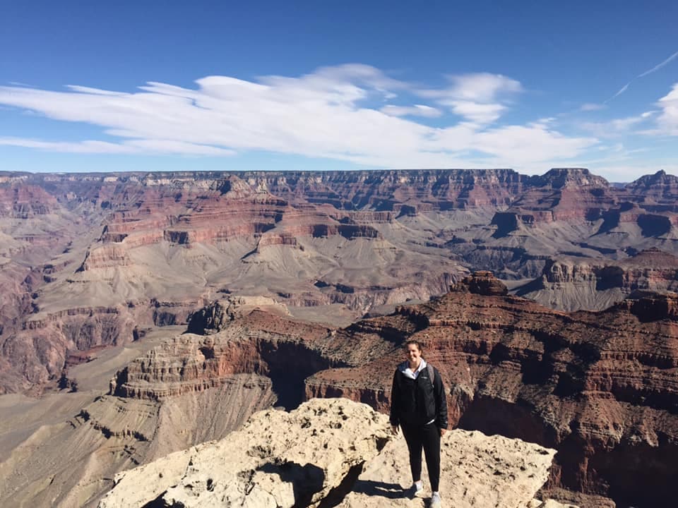 Travel advisor posing in a dried-out region