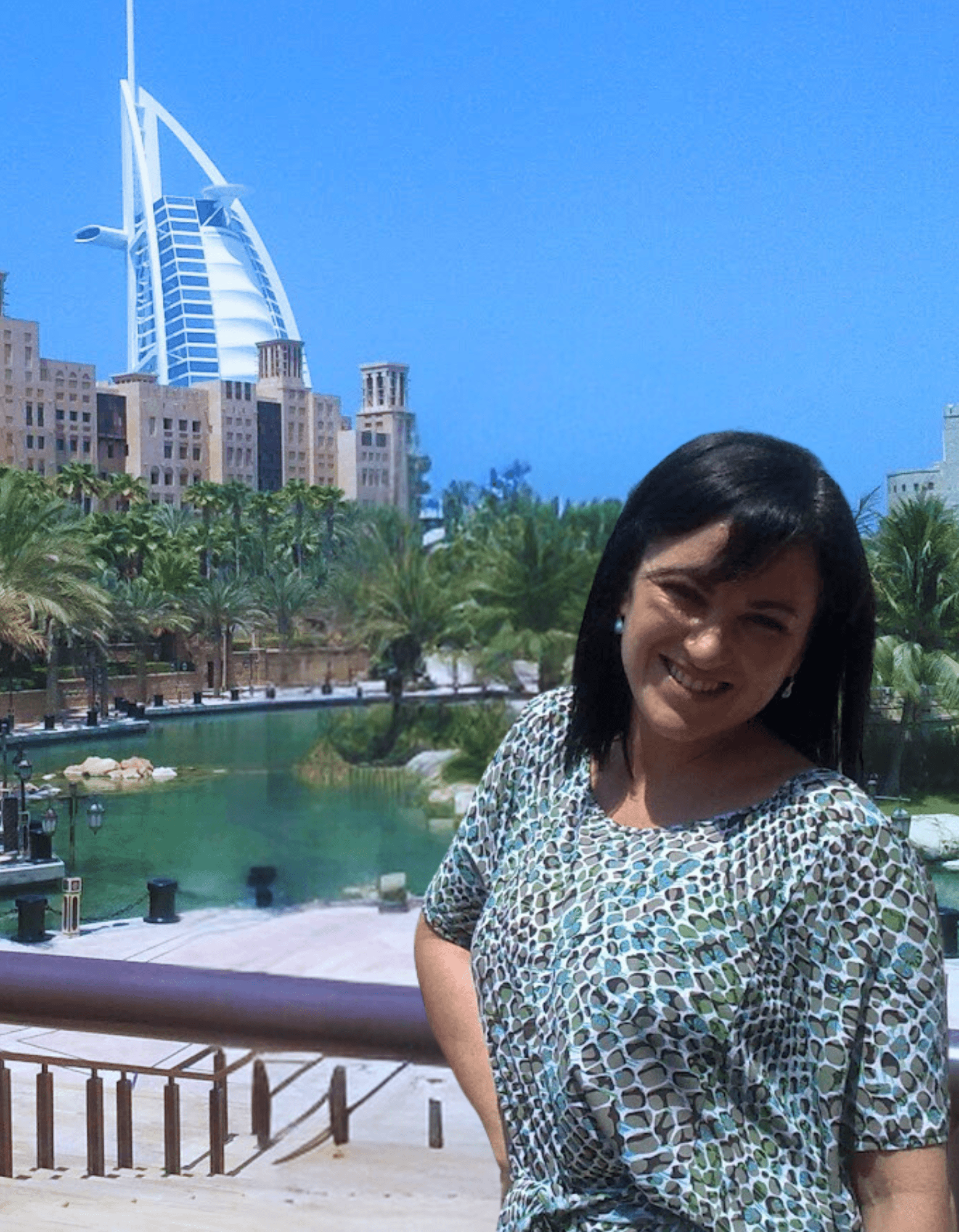 Natasha posing infront of a building in Dubai