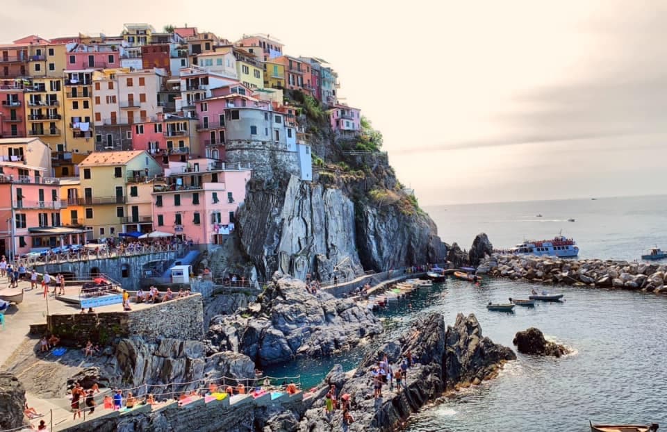 Enchanting image of a residential neighborhood built on a mountain by the Mediterranean Sea.