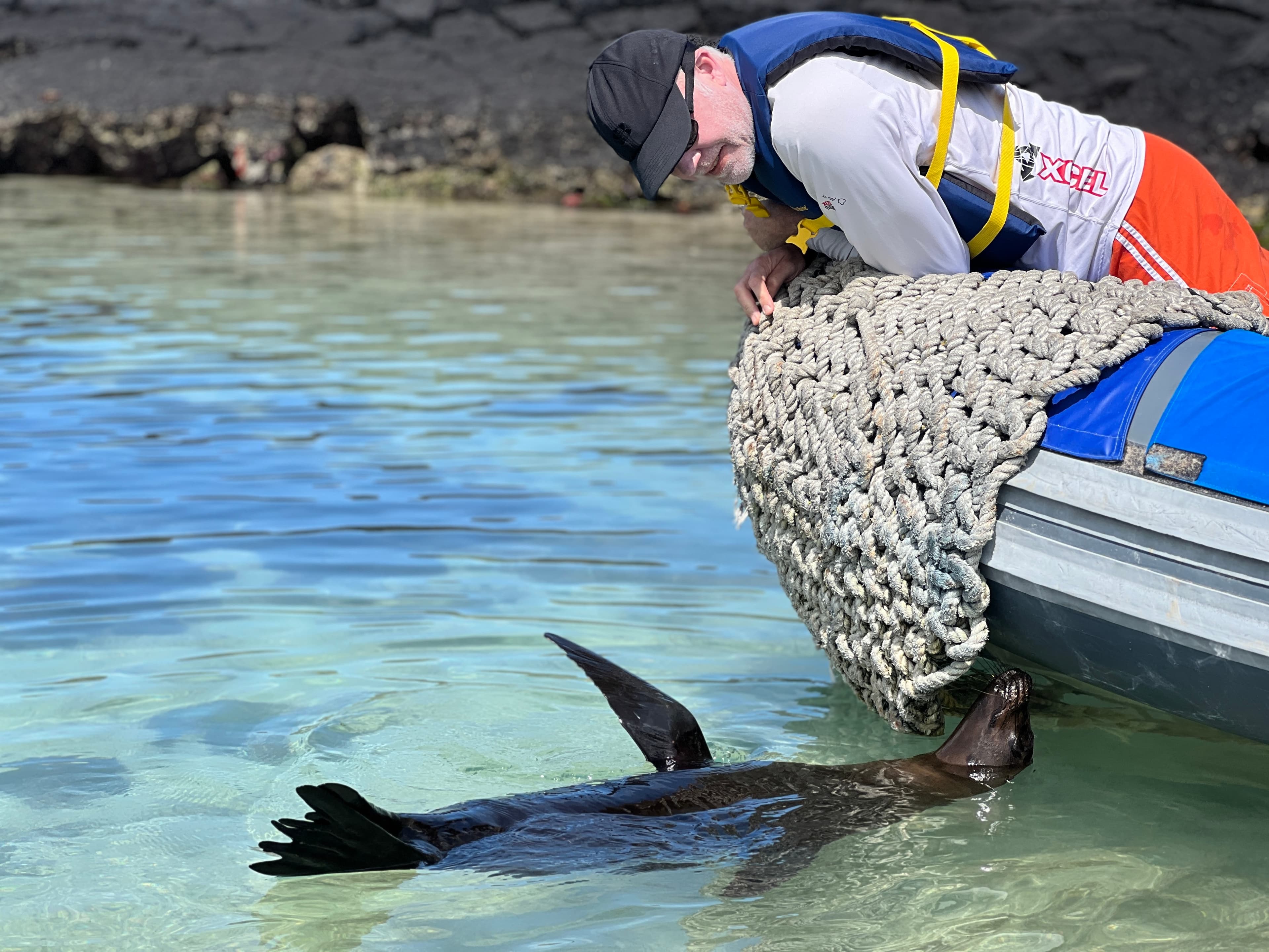 Travel advisor posing in a boat