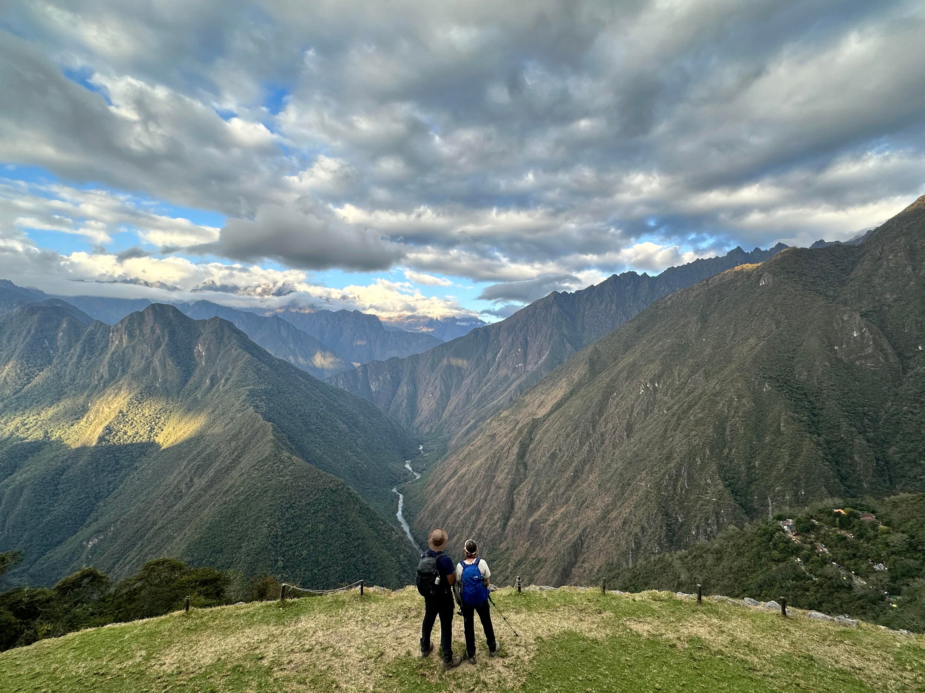Travel advisor posing in a valley