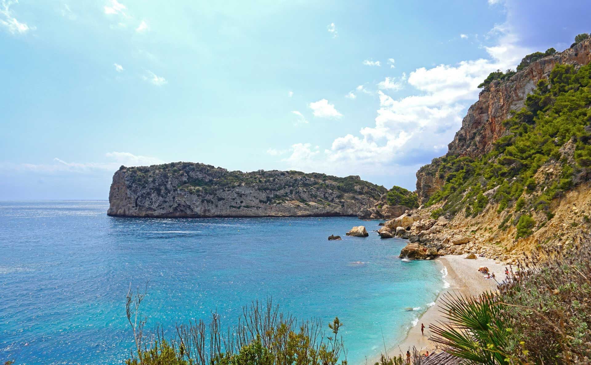 coastal cliffs into blue water
