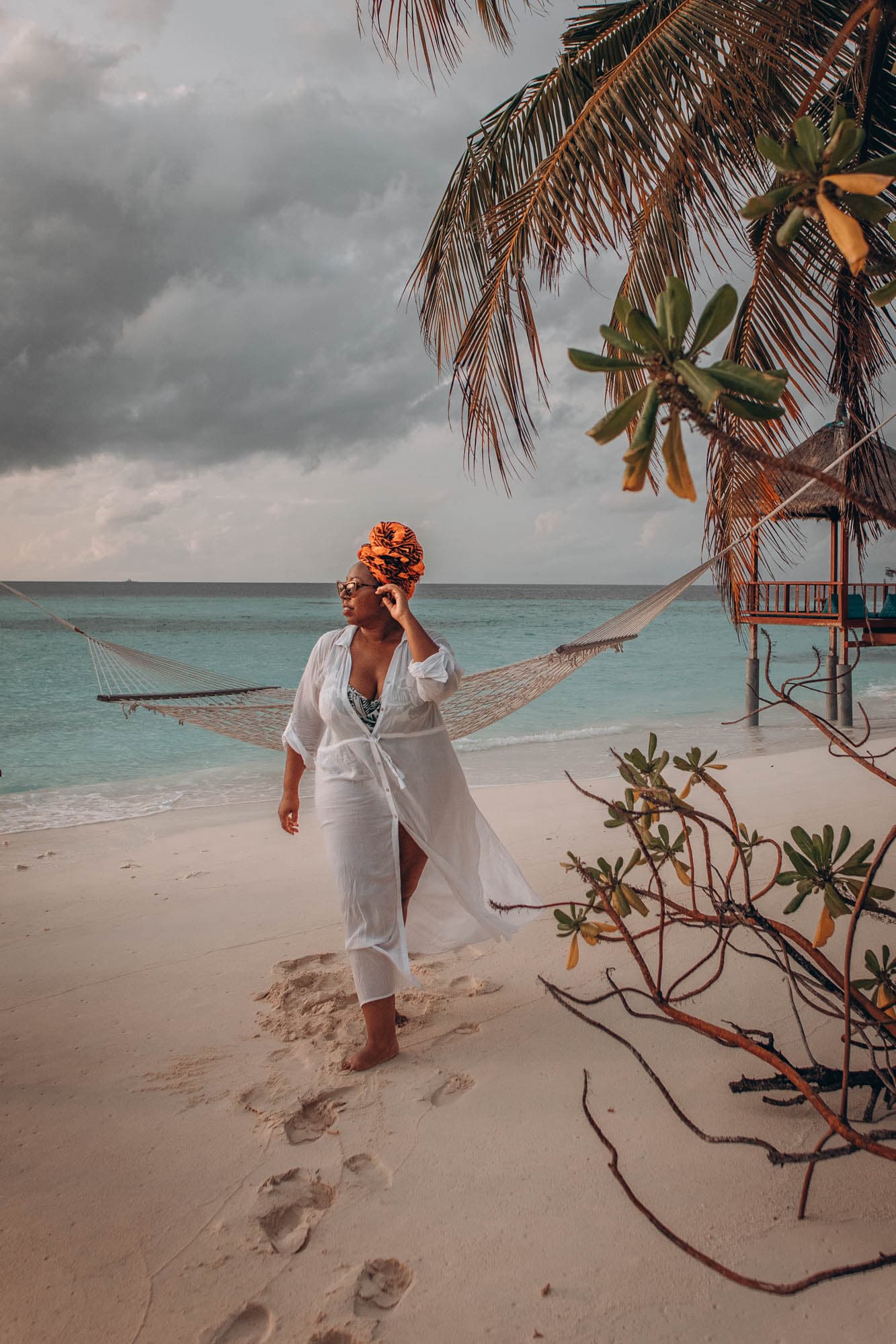 Picture of Eulando in white dress on beach