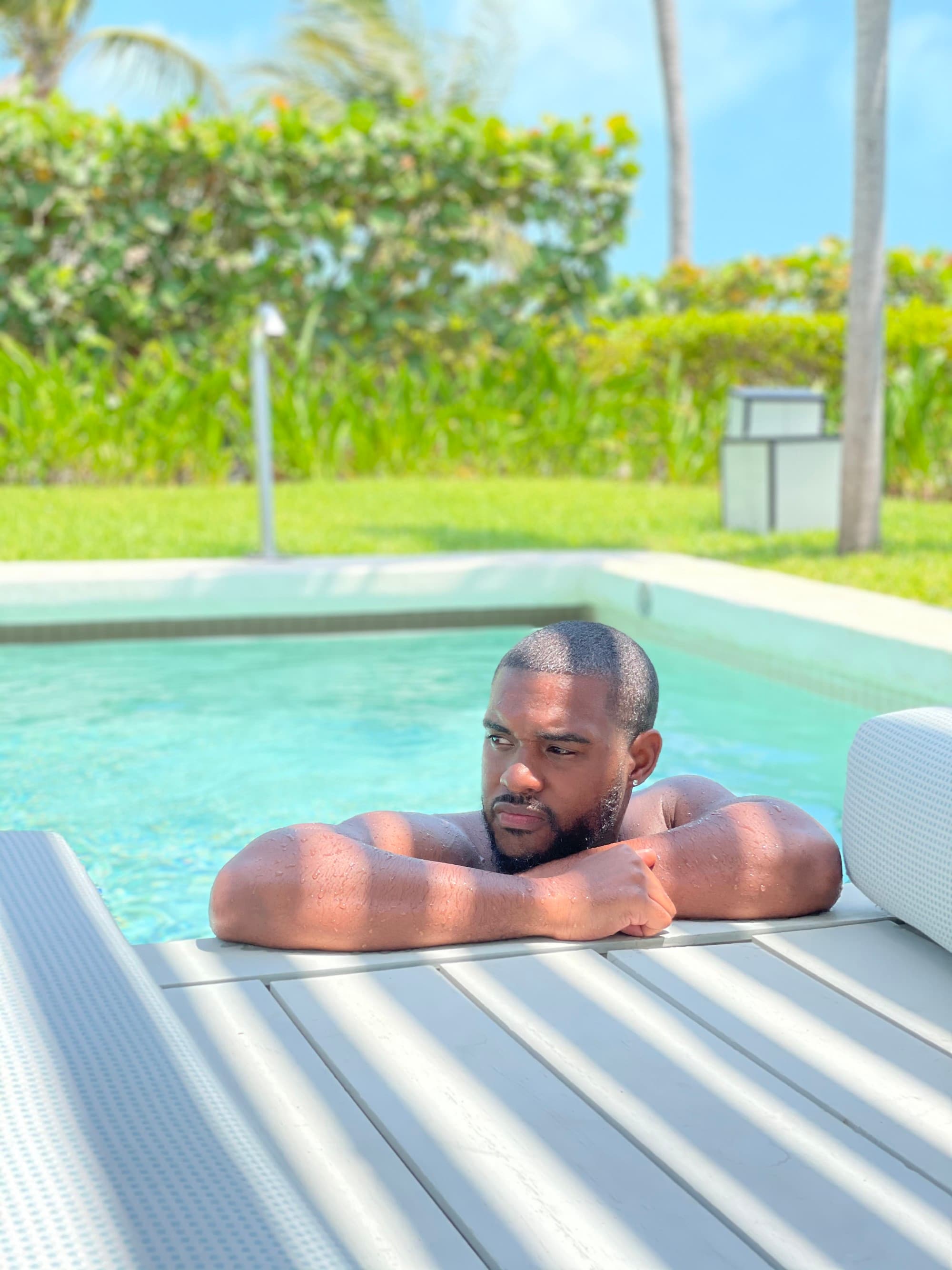 Travel advisor in a pool.