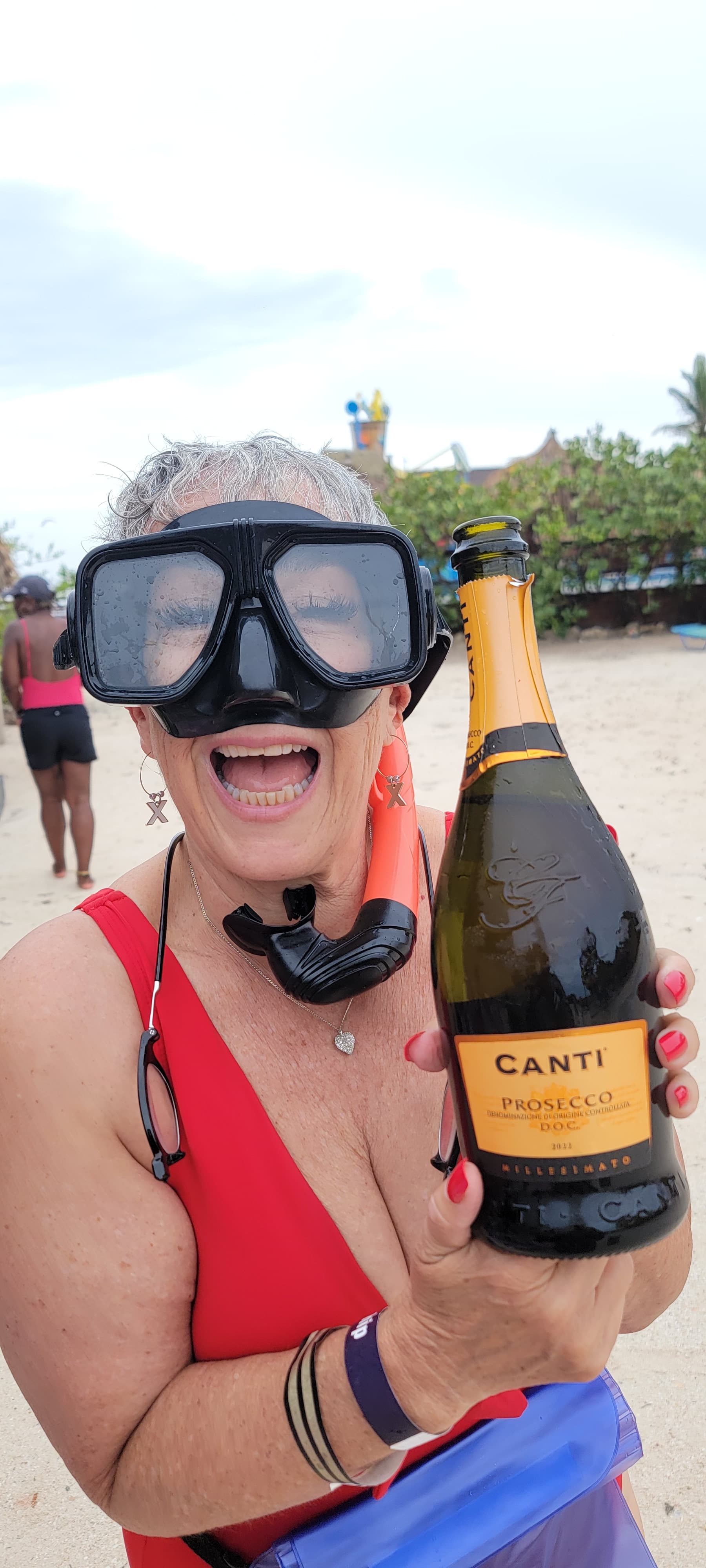 Posing with a bottle of champagne