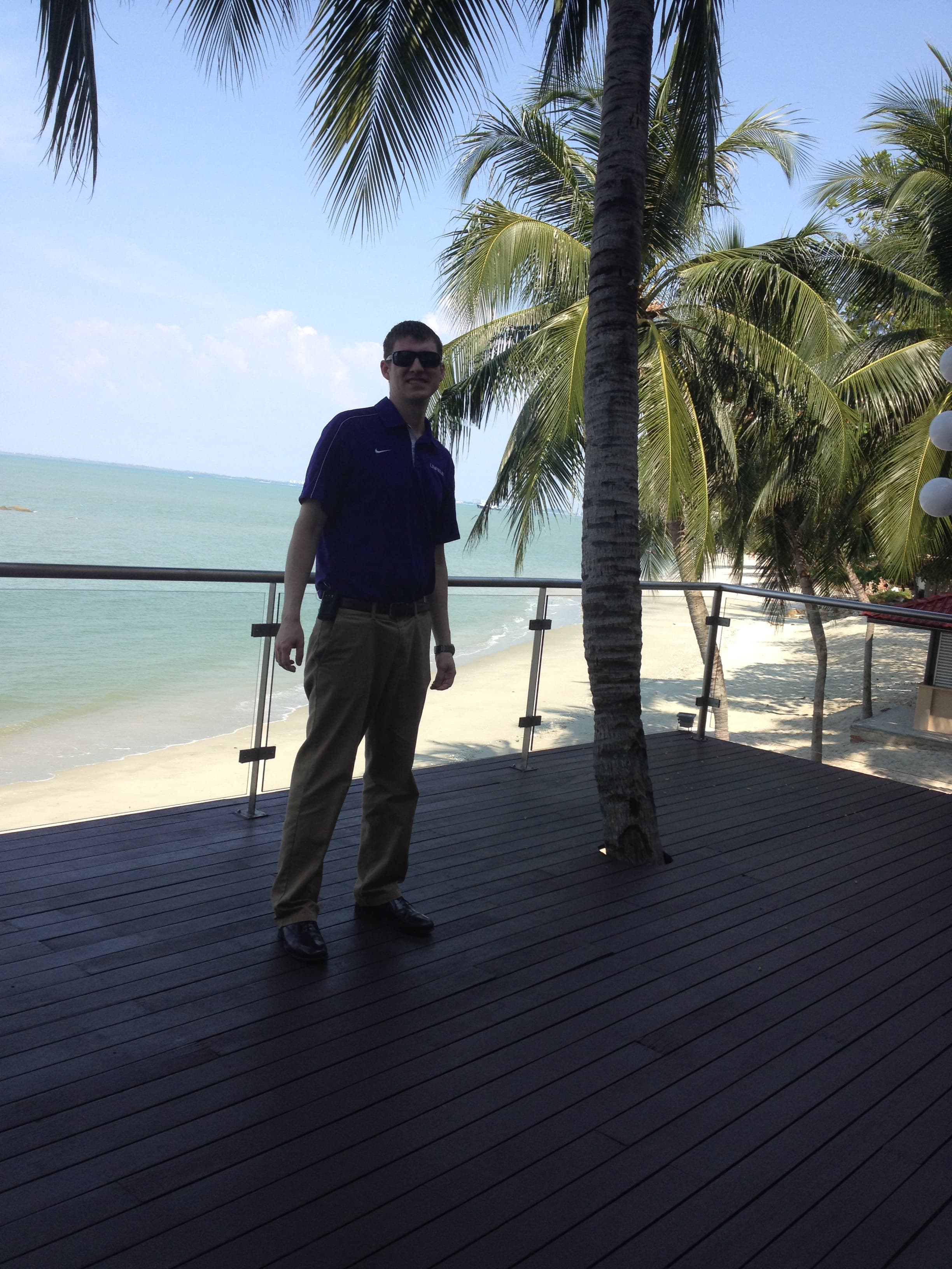 Posing for a picture on a deck