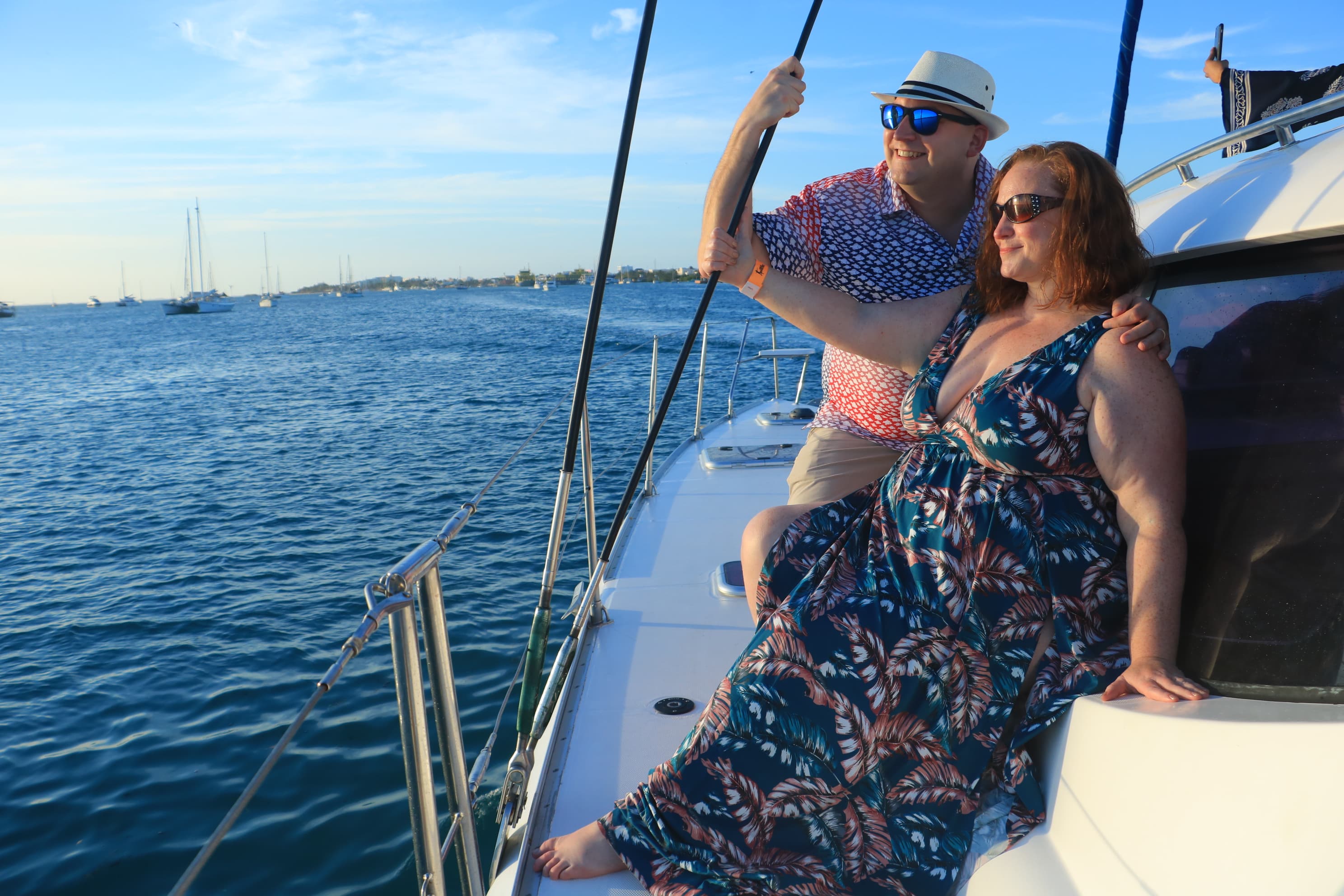 Couple posing on a boat.