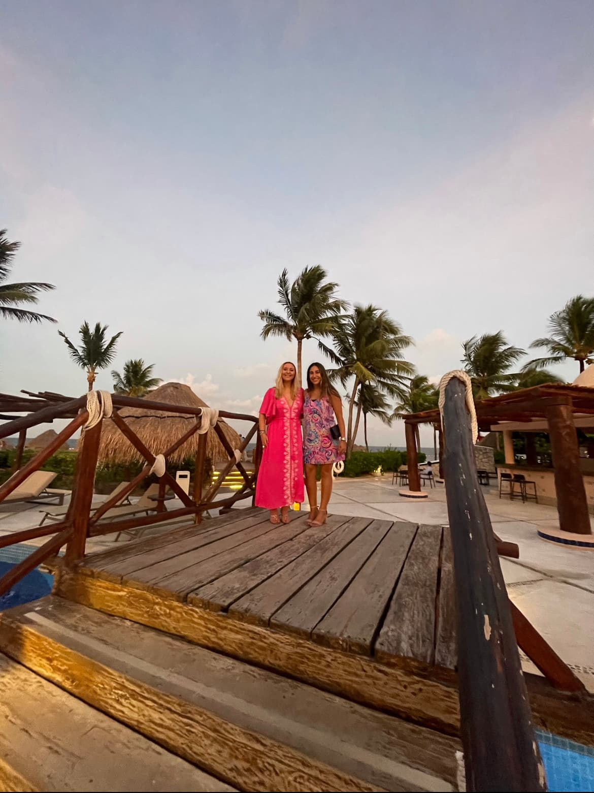sarah and her friend in a tropical land