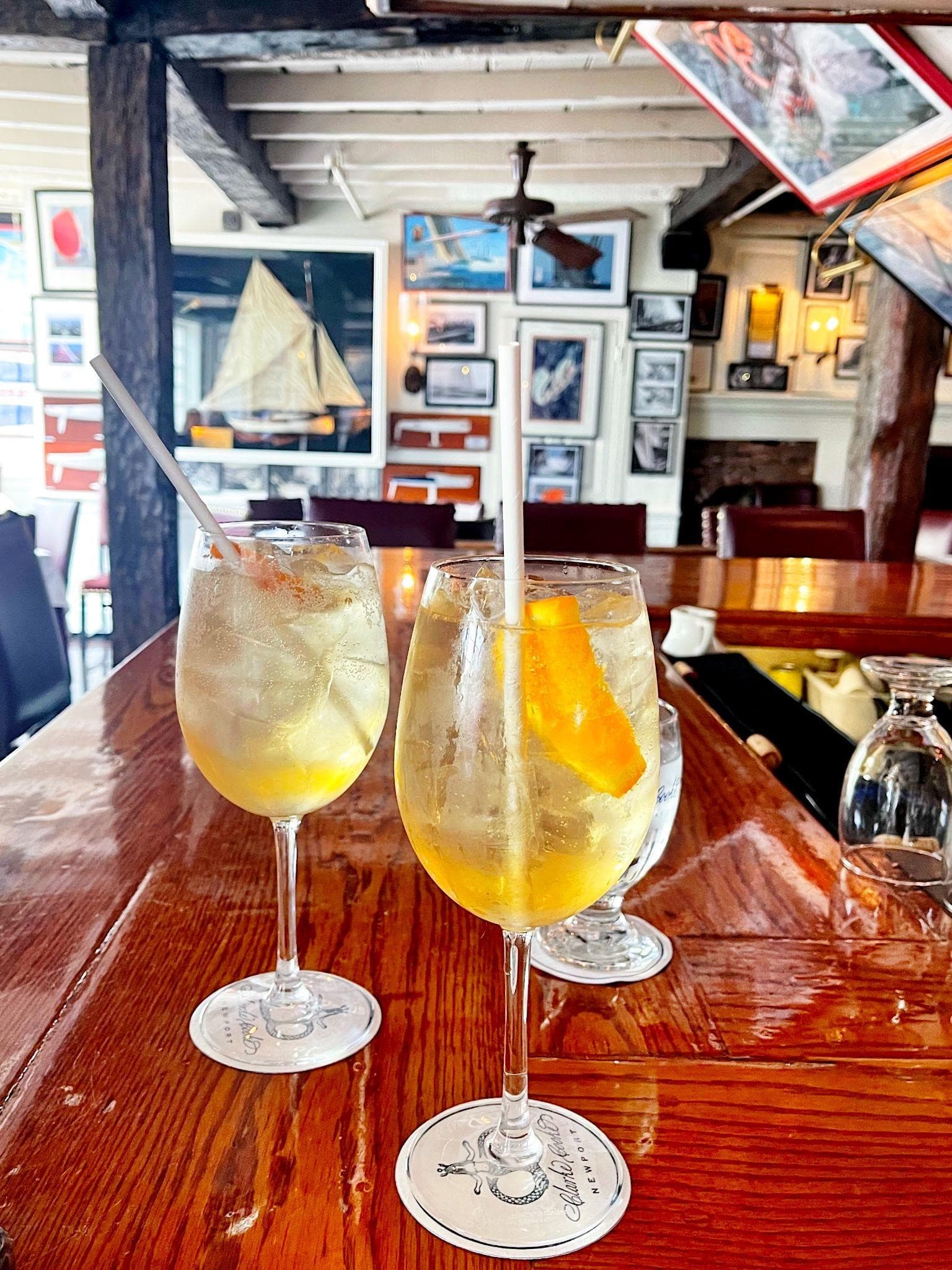 2 drinks on a table in a restaurant