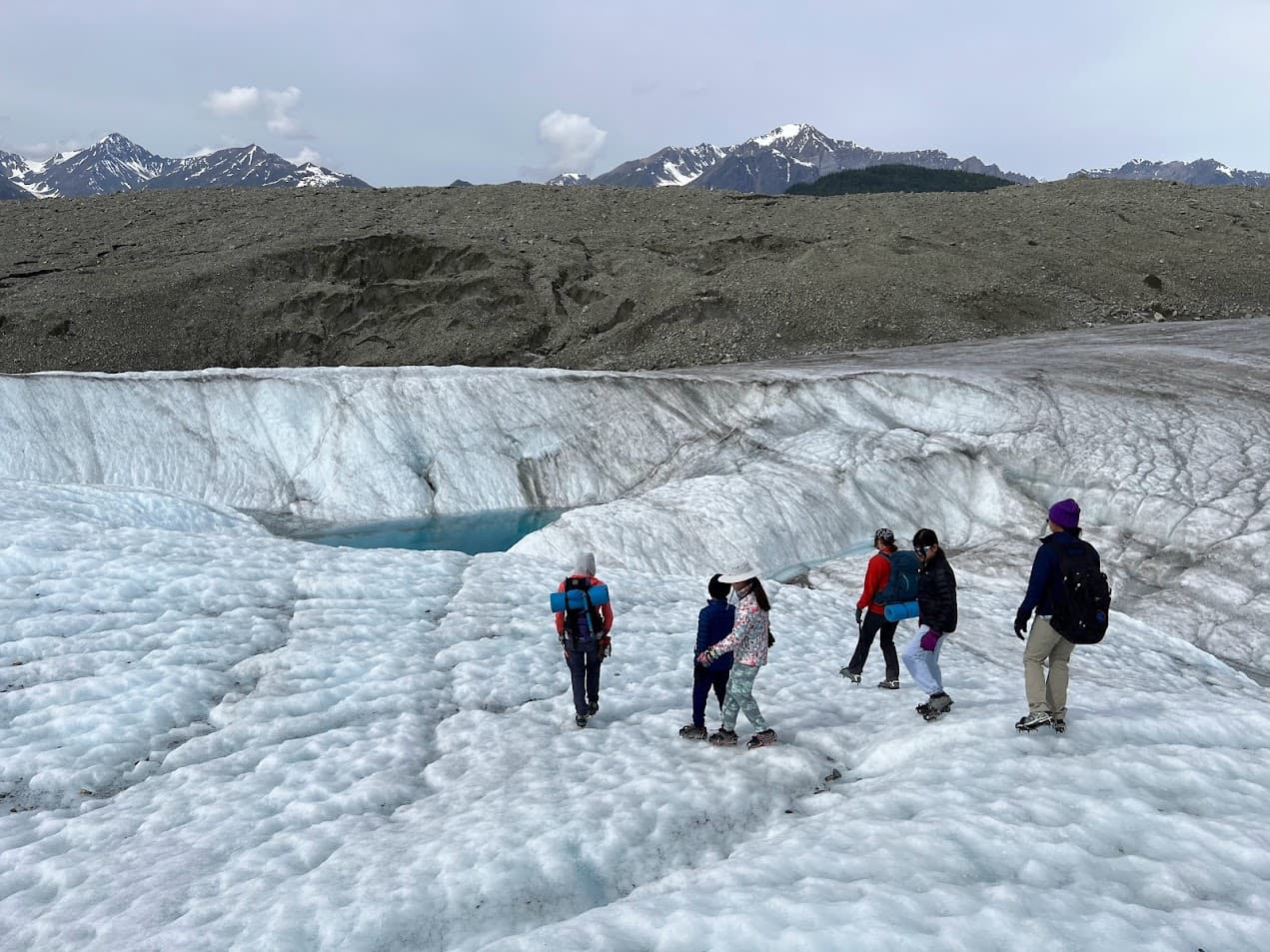 People waling on snow.