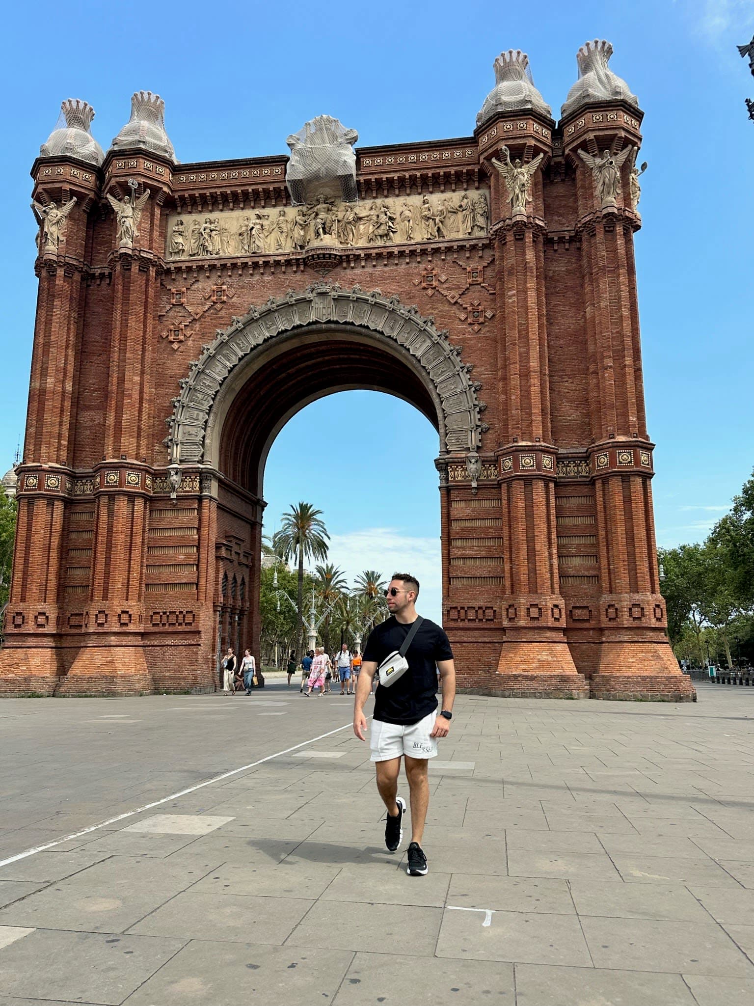 Posing for a photo at the Arc de Triomf monument