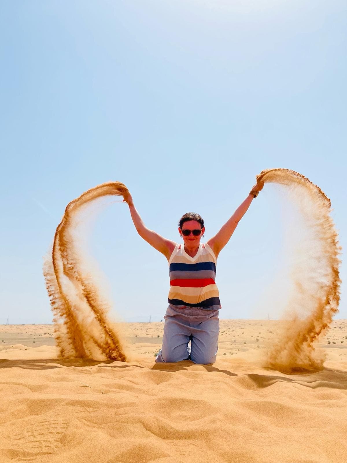Making sand angels in the desert