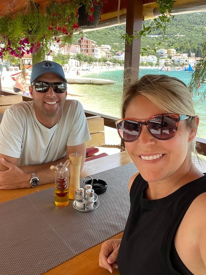 Posing for a couple photo at a restaurant