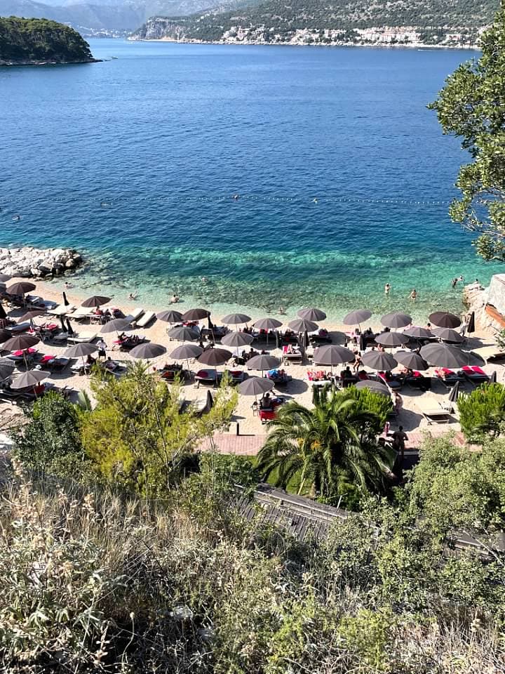 View of black umbrellas on the beach