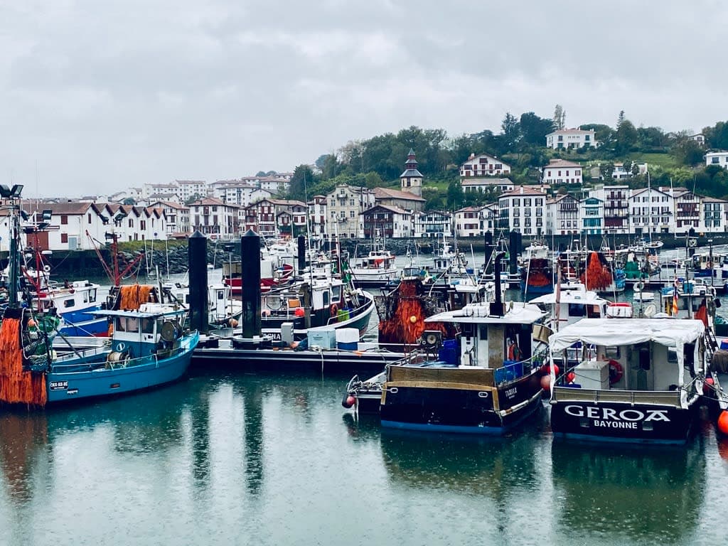 View of boats at Saint Jean De Luz, a harbor at the edge of a town