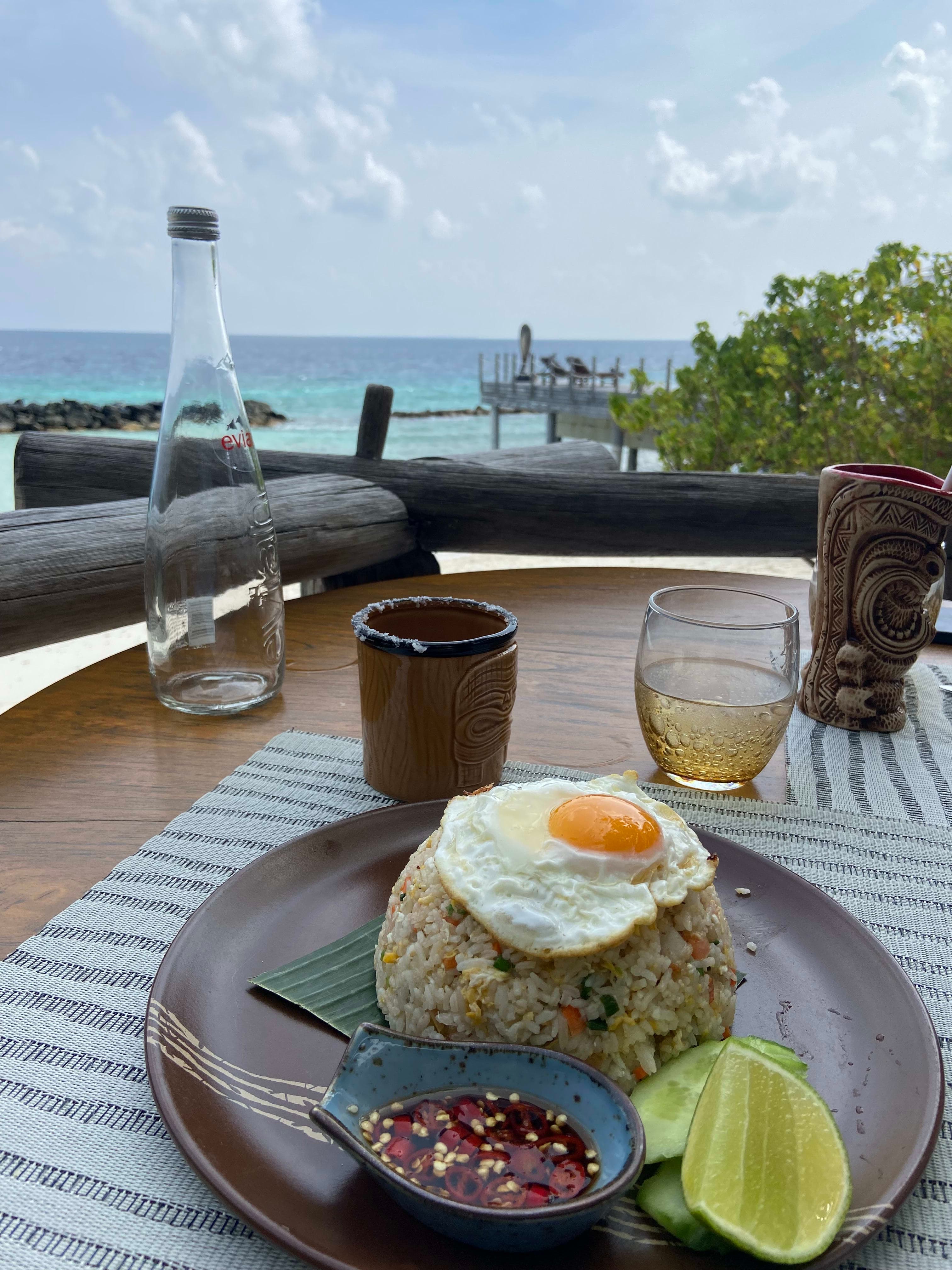 Having fried rice with beautiful view