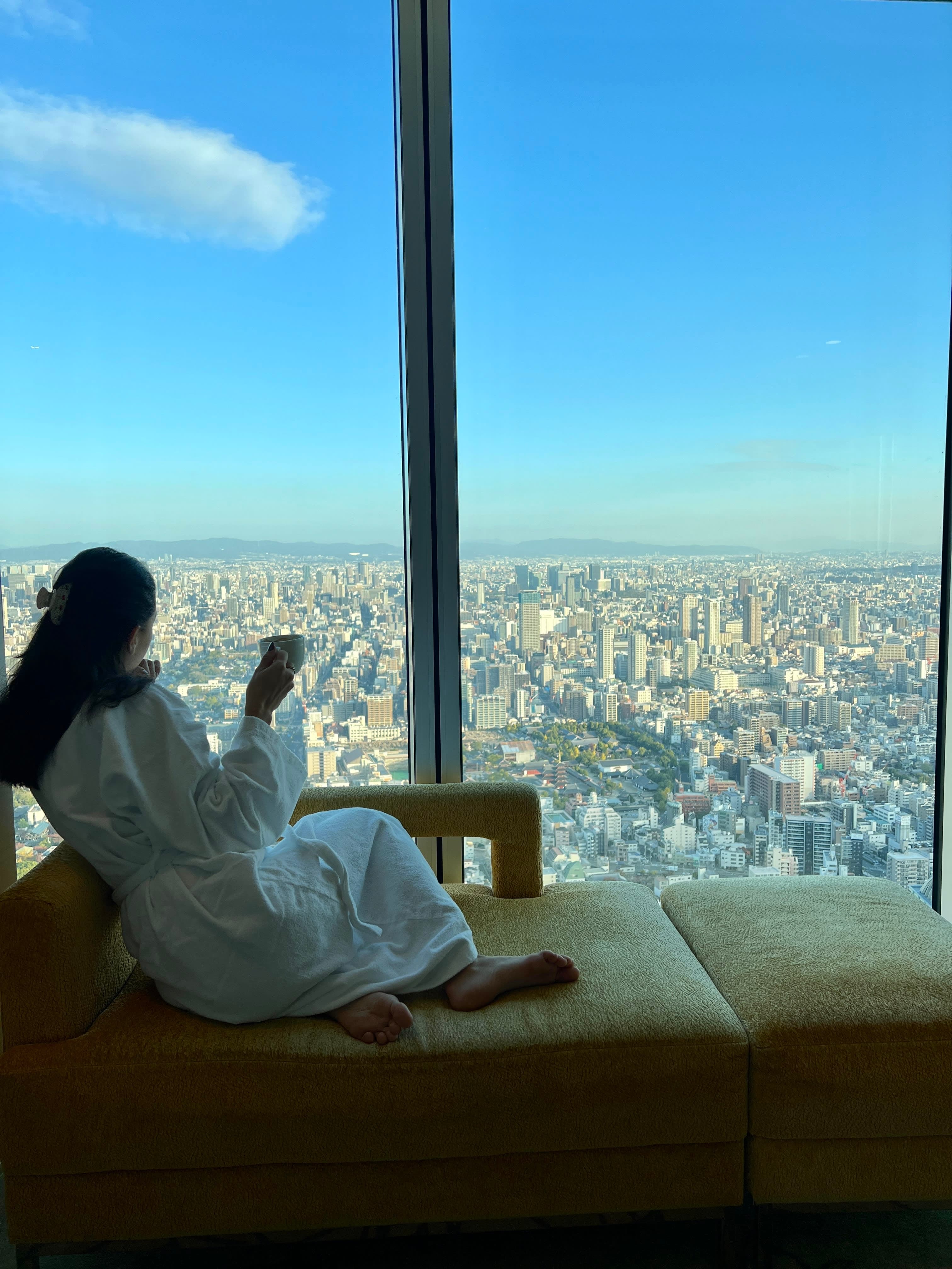 Having a cup of coffee and looking at the city views