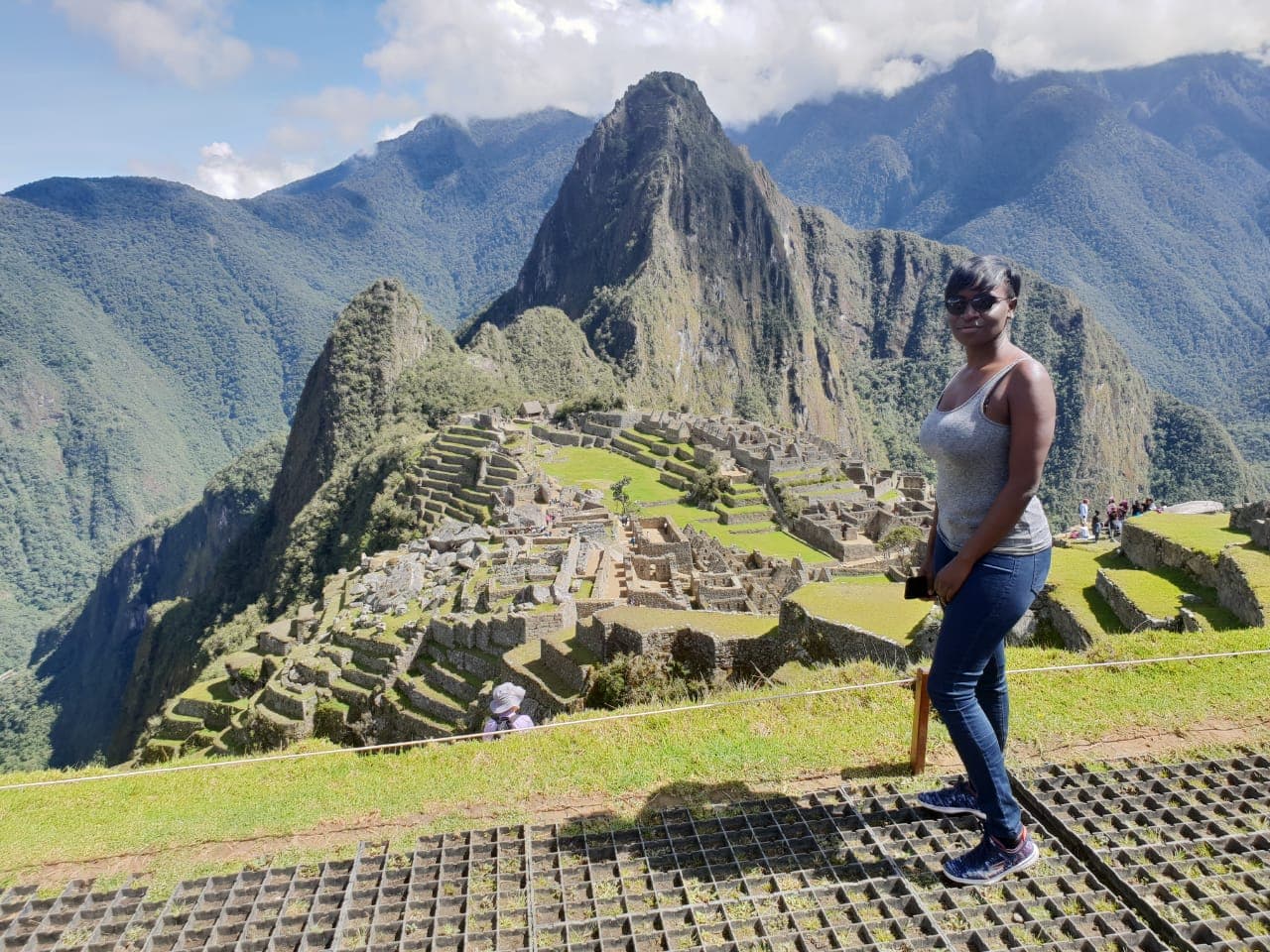 Posing for a photo at the Historic Sanctuary of Machu Picchu