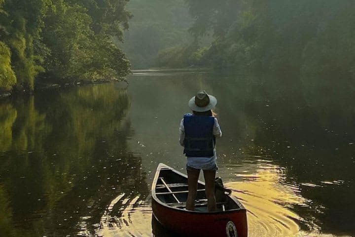 Picture of Loiuse standing in boat