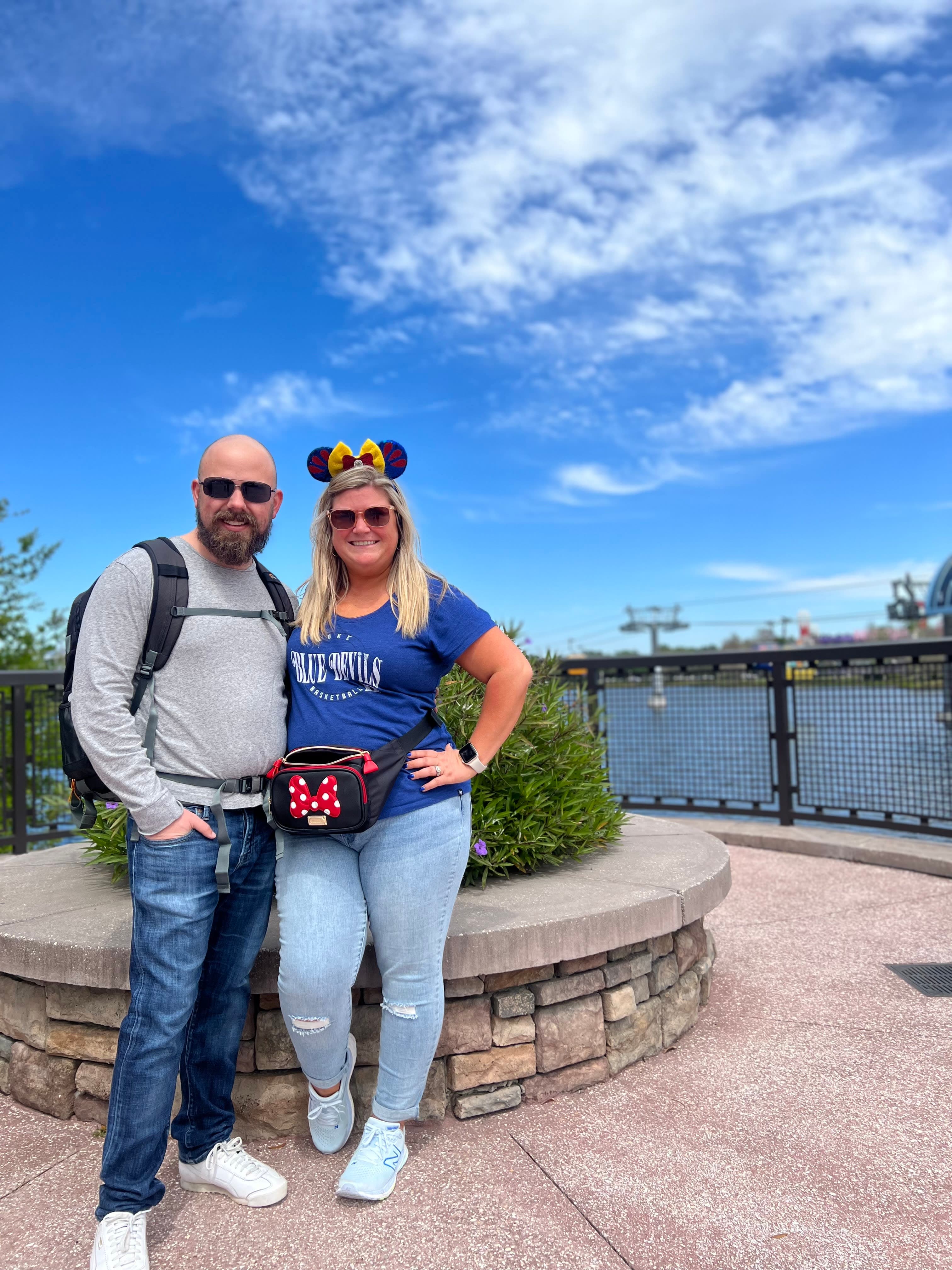 Picture of Brittany wearing Minnie Mouse ears, posing next to a man