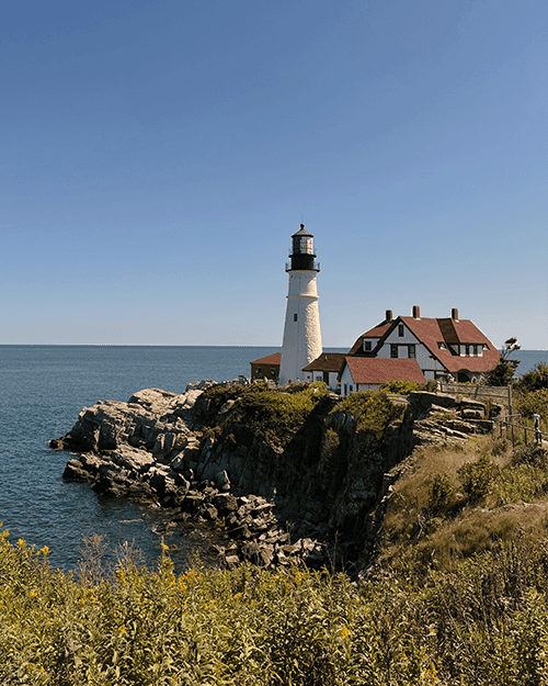 Portland Head Light, Maine's oldest lighthouse, stands majestically on the rugged cliffs of Cape Elizabeth.
