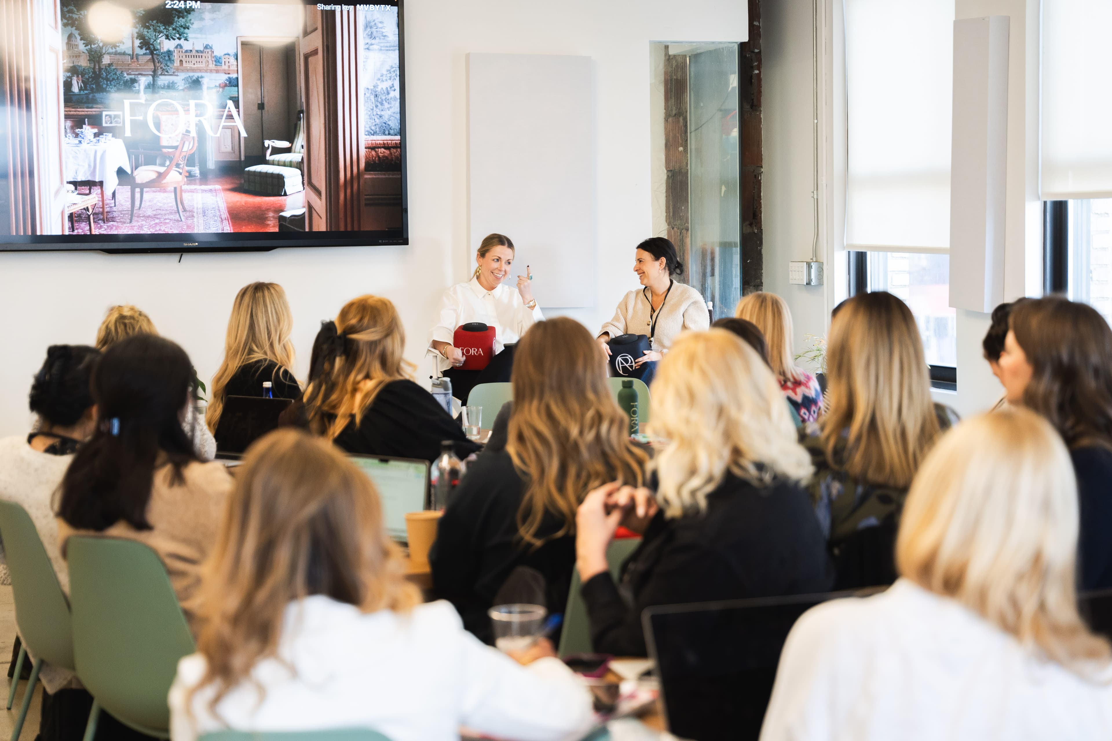 a yellow staircase zigs and zags up the side of a building