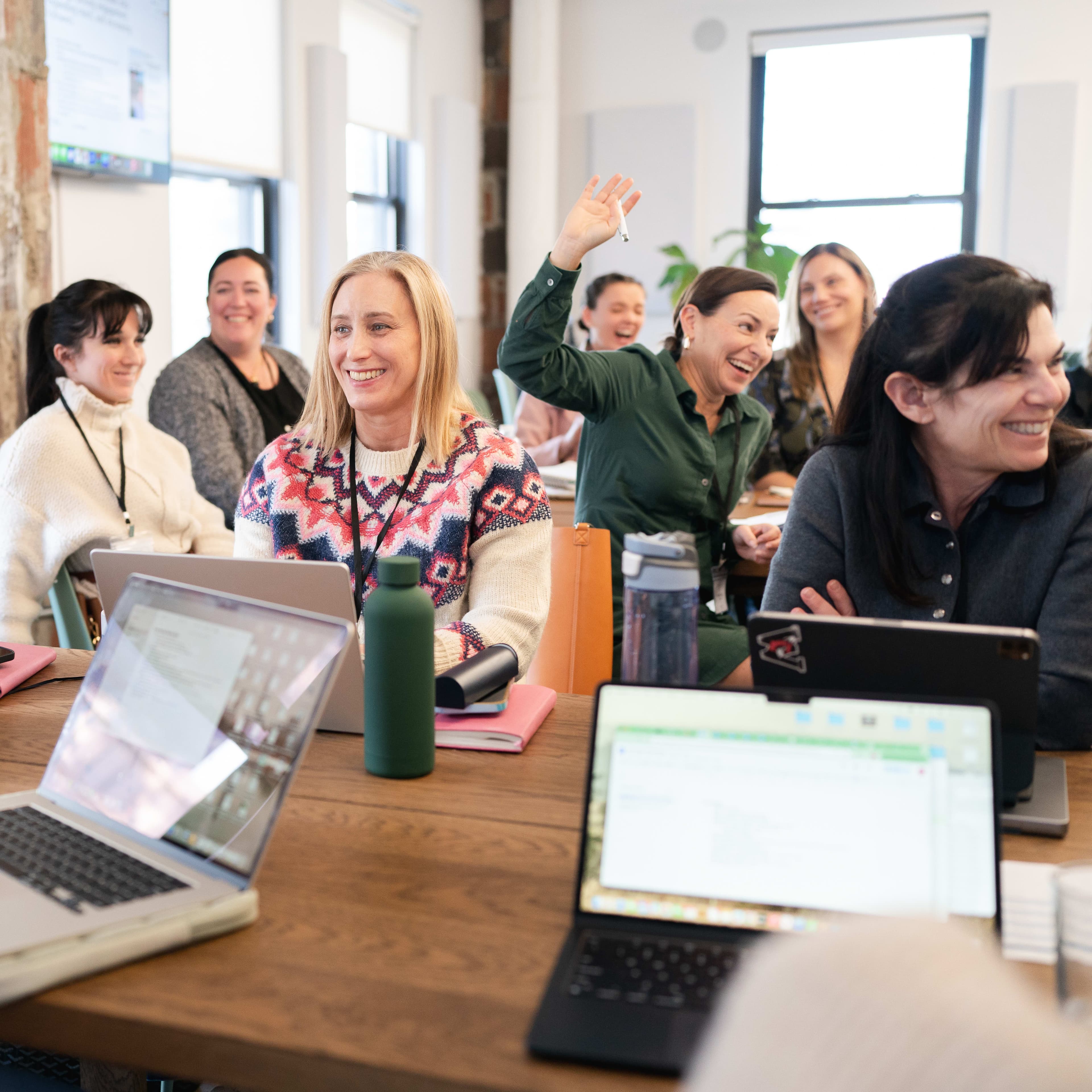 a striped cloth lounge chair near the side of a pool