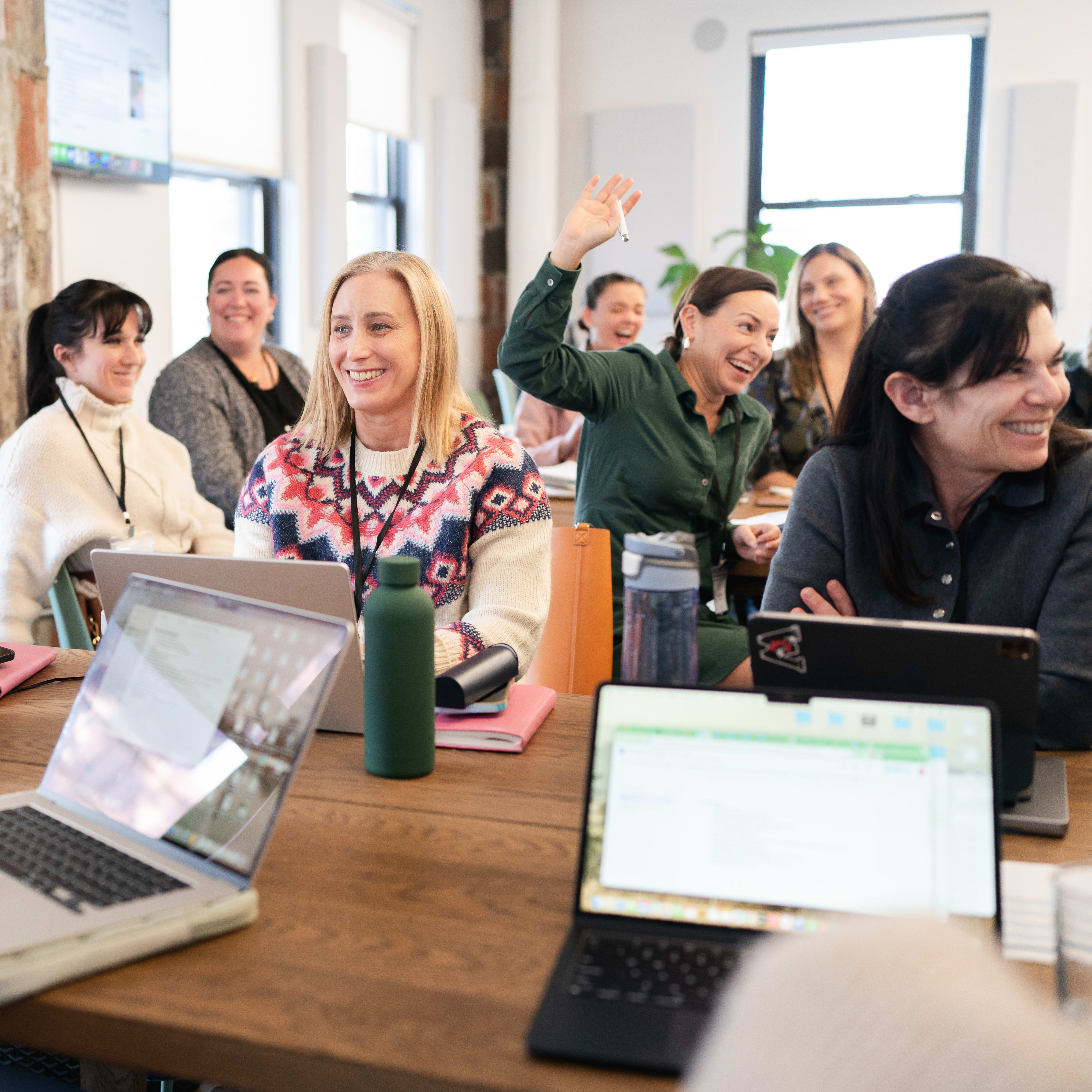 a striped cloth lounge chair near the side of a pool