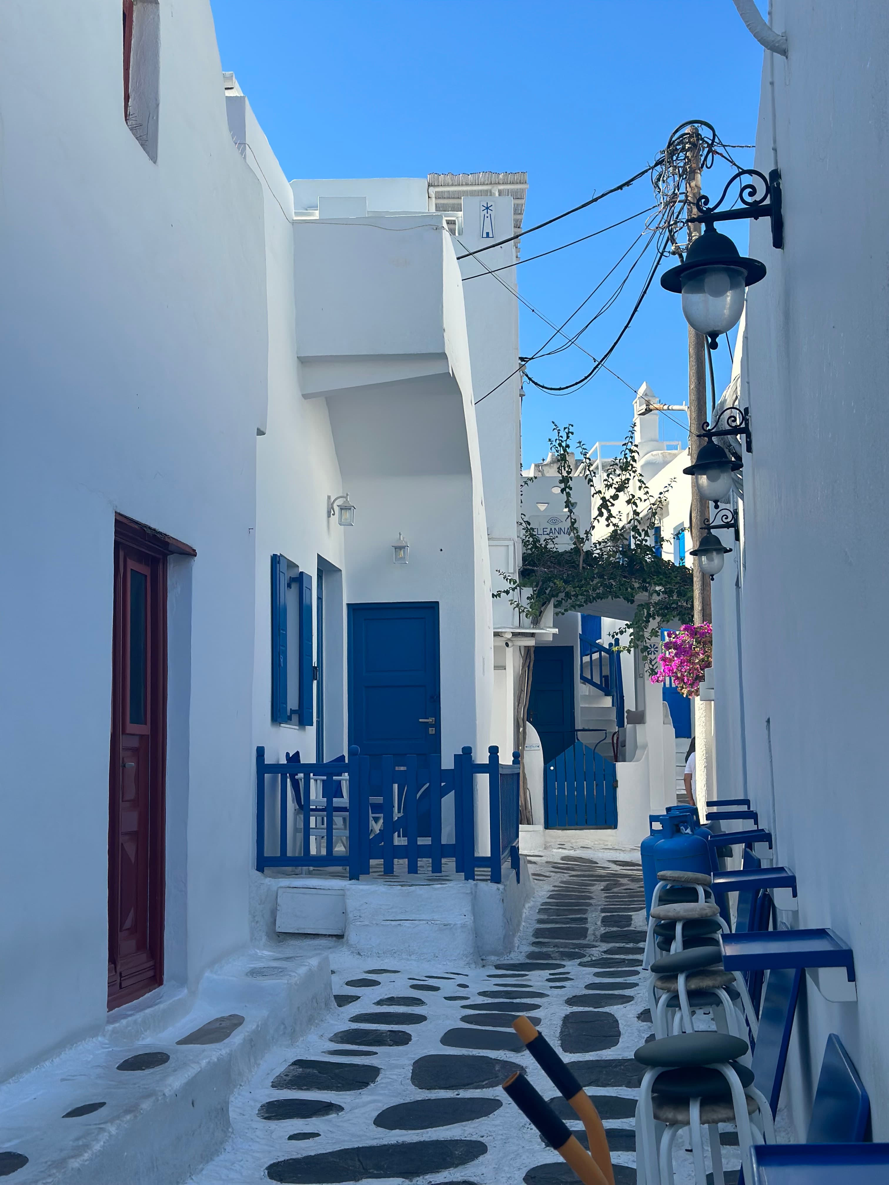 A beautiful narrow street in Greece on a sunny day.