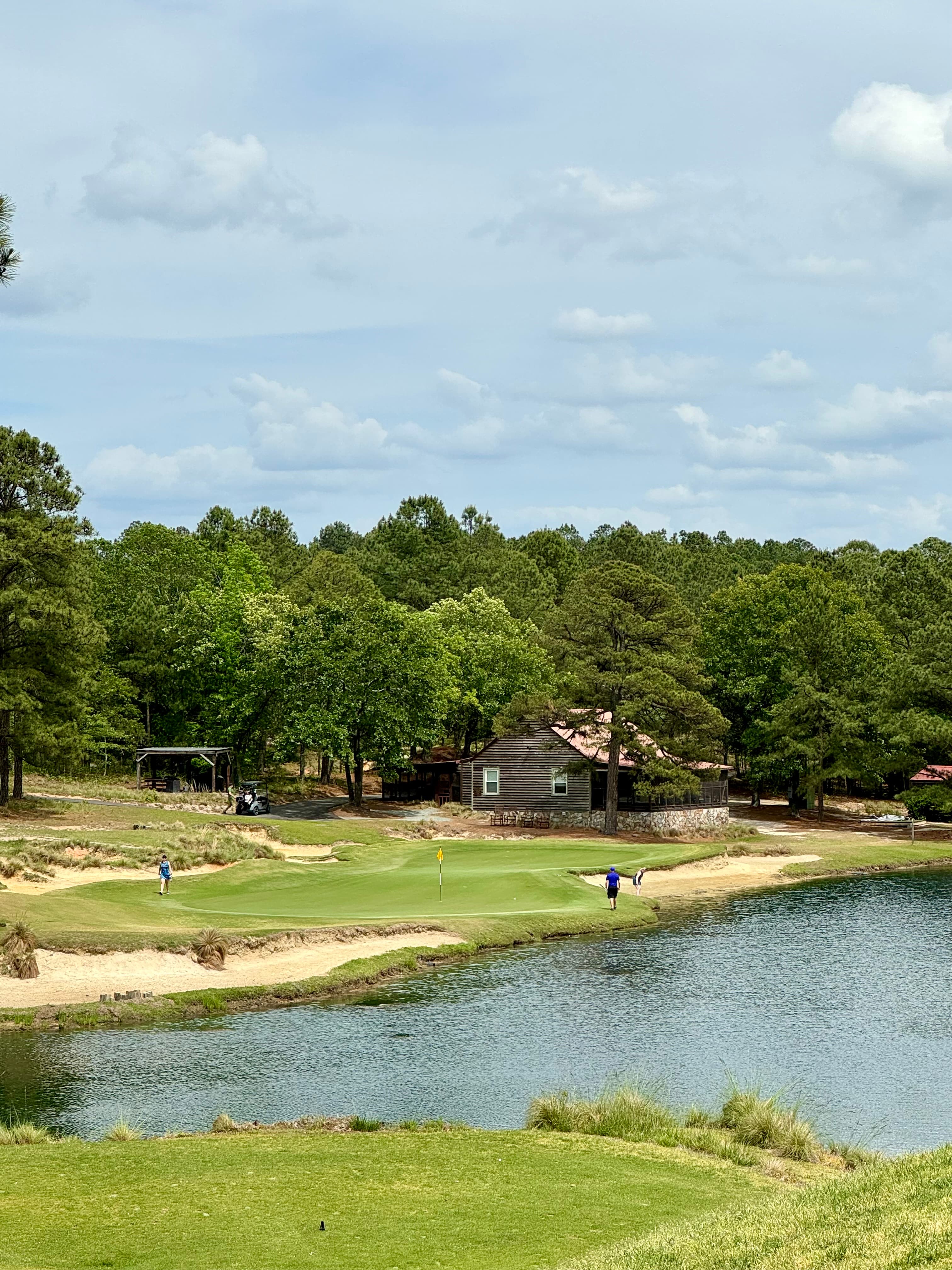 Image of a golf course on a sunny day.