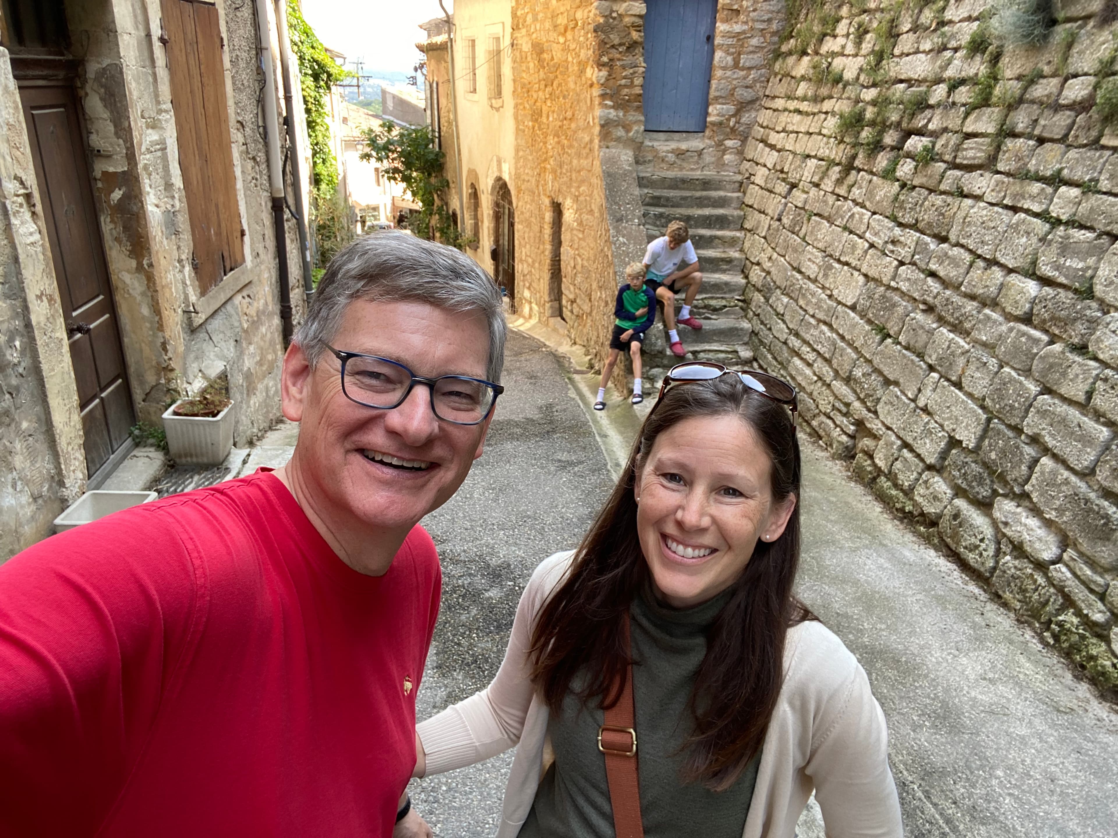 A couple posing on a sunny day.