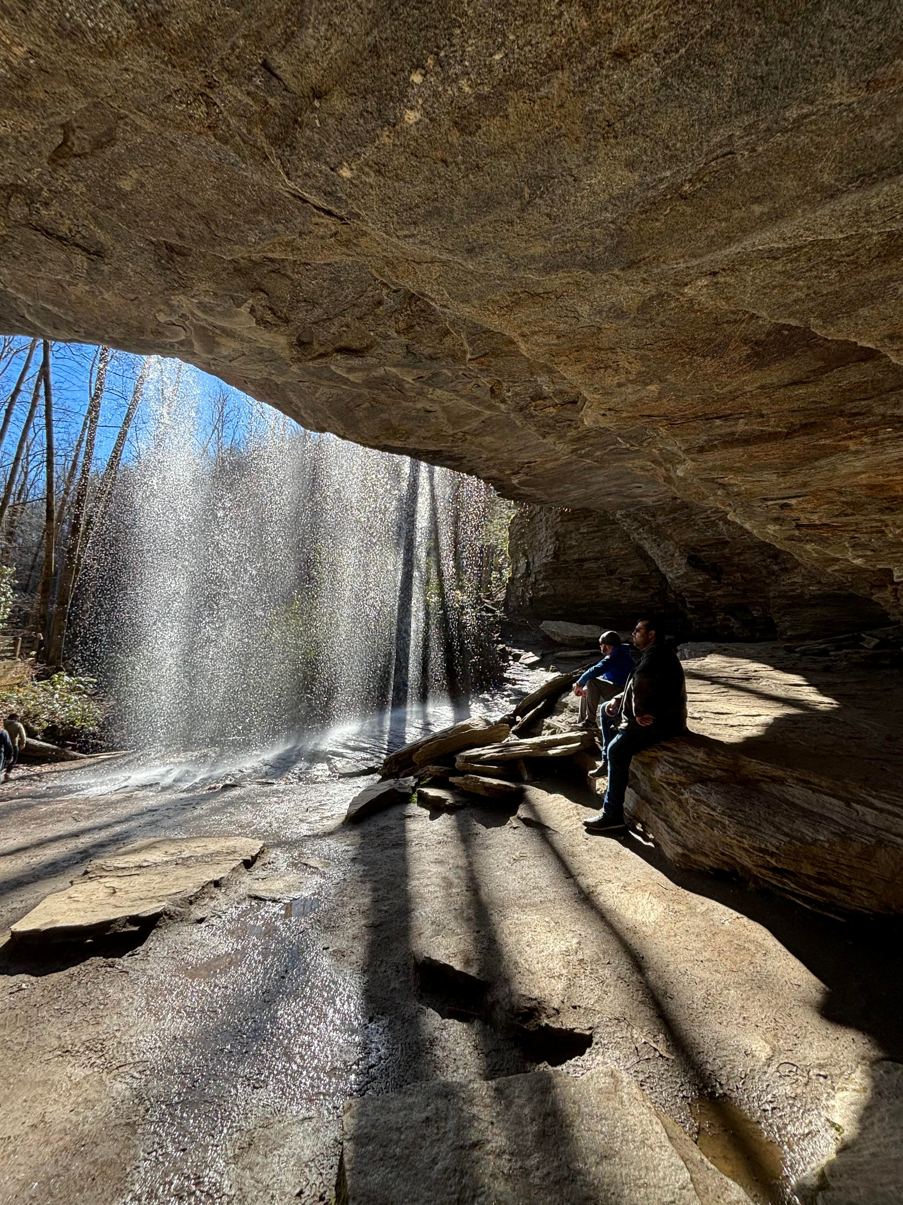 Light seeping out from under a cave.