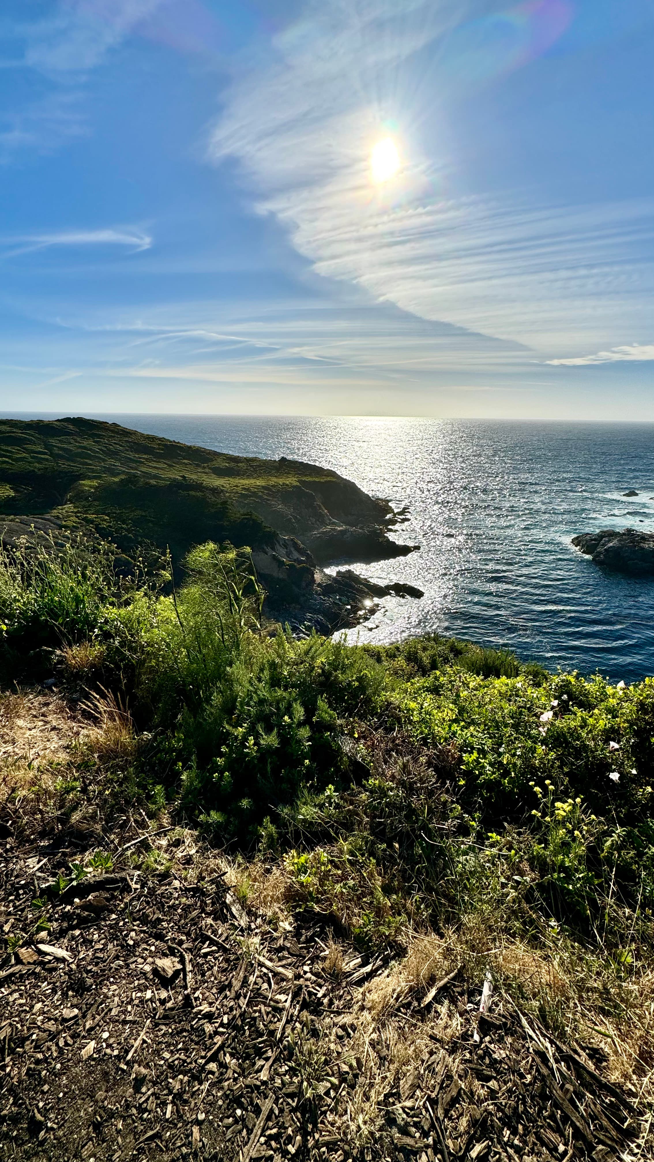 Beautiful view of a coastline with cliffs under sunny skies